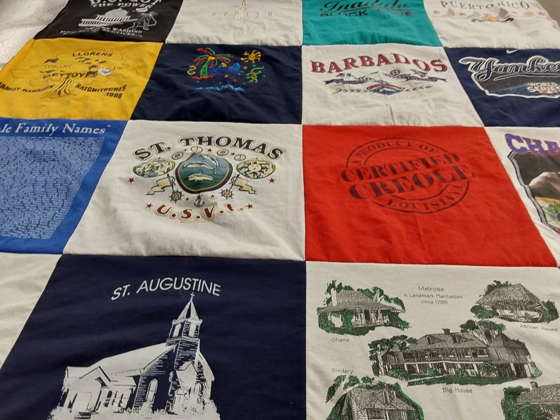 T-shirt quilt with travel, heritage themes by Angela from CA