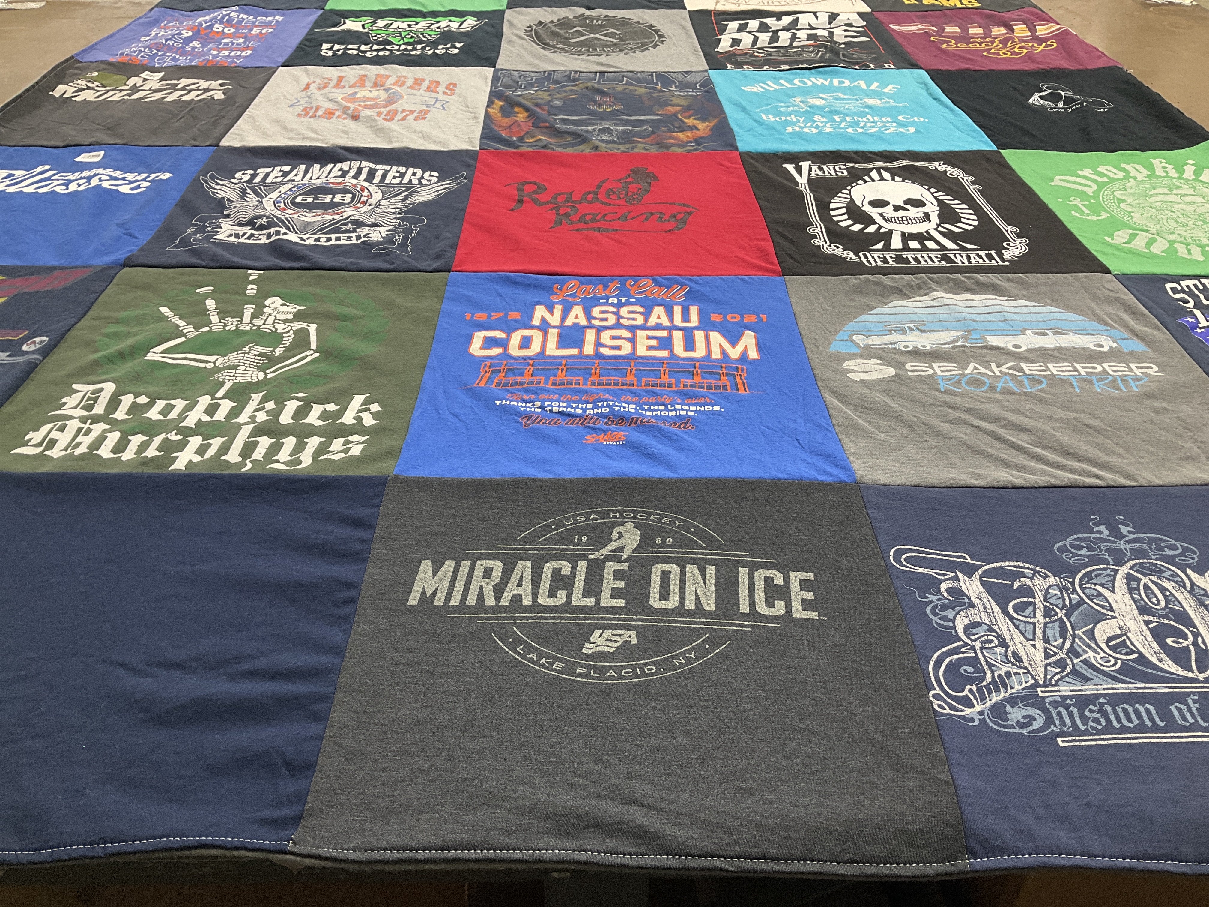 T-shirt quilt with music, sports themes by Michael from NY