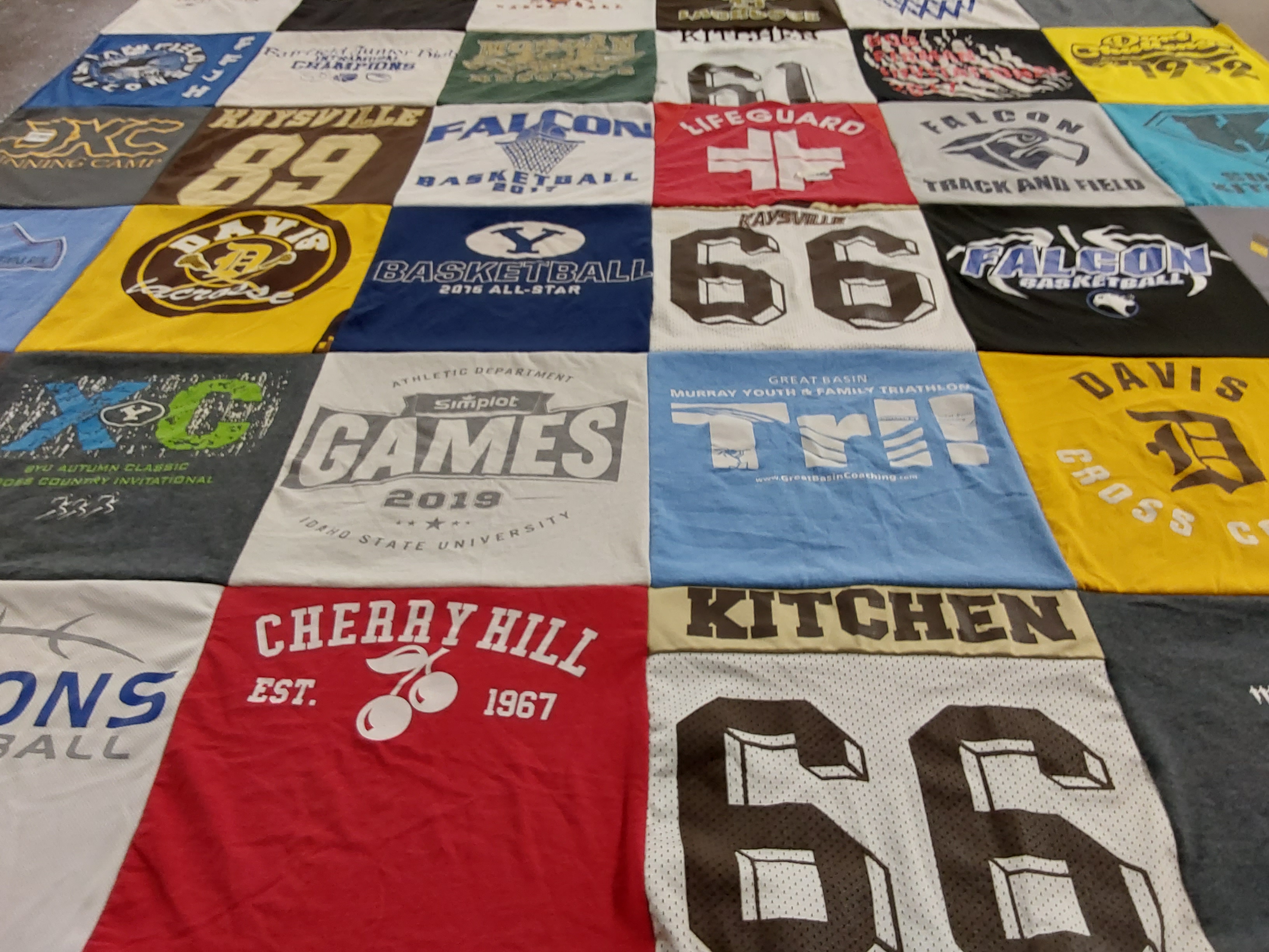 T-shirt quilt featuring davis high school cross country, davis high school basketball by Leslee from UT