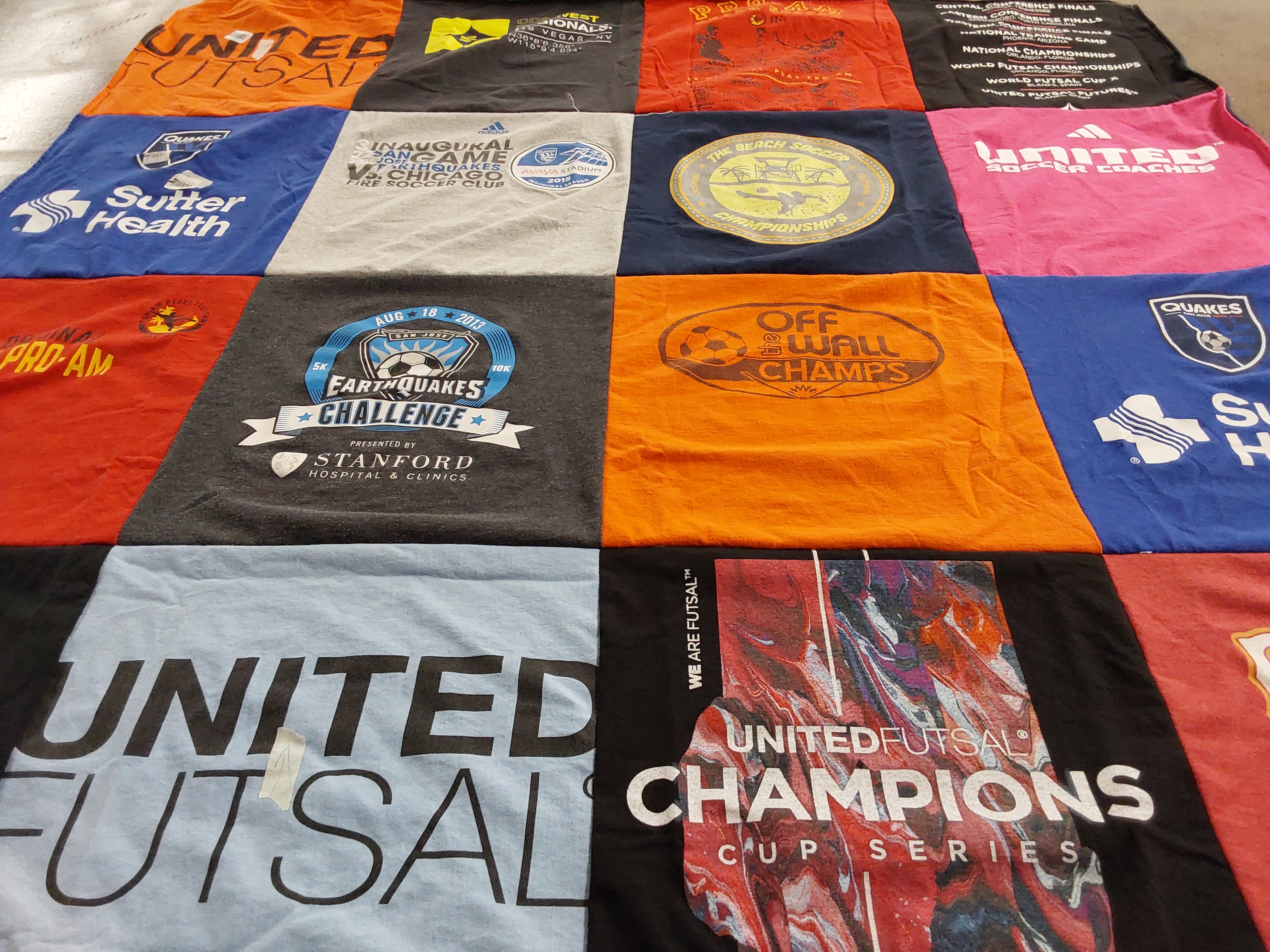 T-shirt quilt featuring earthquakes by Judith from CO