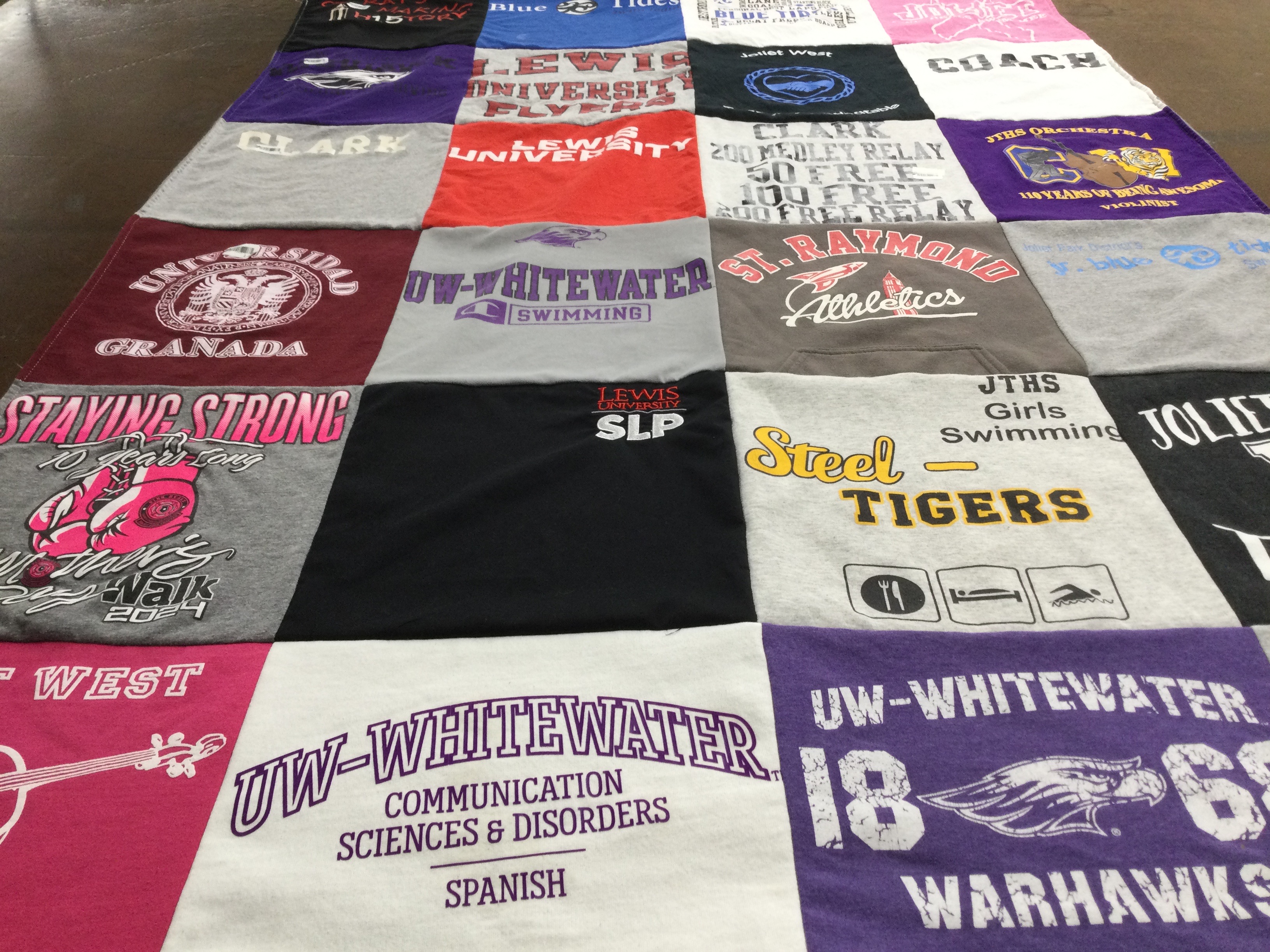 T-shirt quilt featuring jths girls swimming, st. raymond athletics by Jana from IL