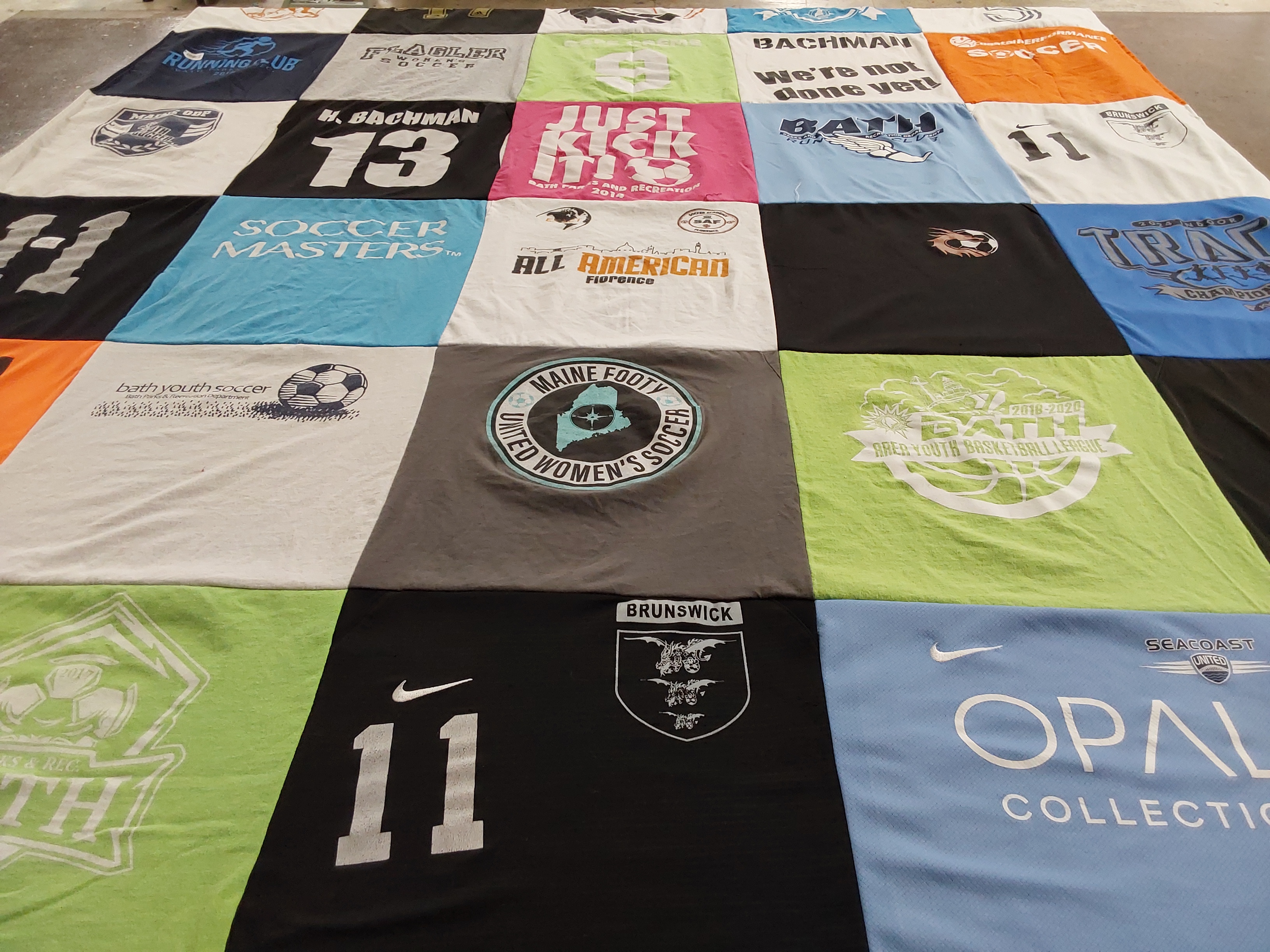 T-shirt quilt with soccer, basketball themes by Tondra from ME