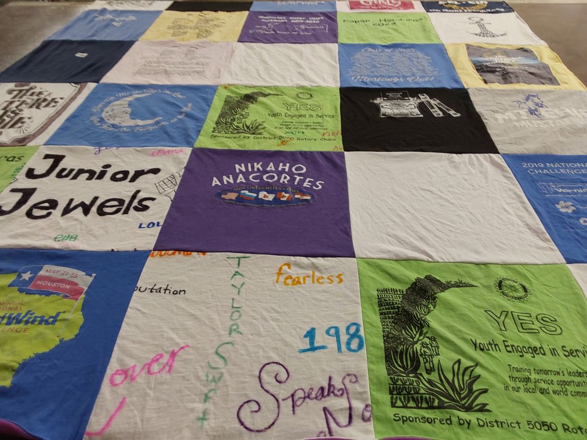 T-shirt quilt with community service, youth engagement themes by Susan from WA