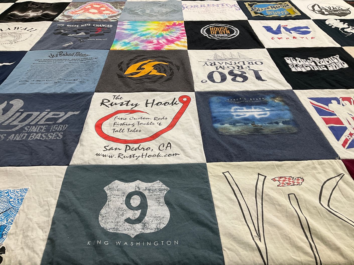 T-shirt quilt with fishing, boating themes by Matt from CA