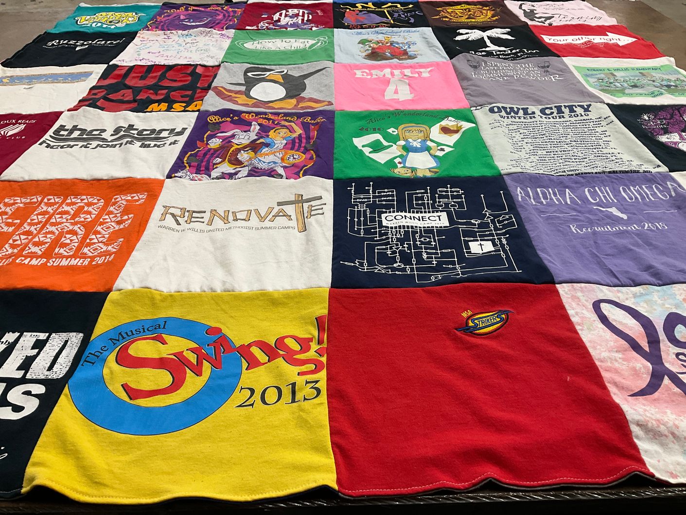 T-shirt quilt with theater, music themes by Sue from FL