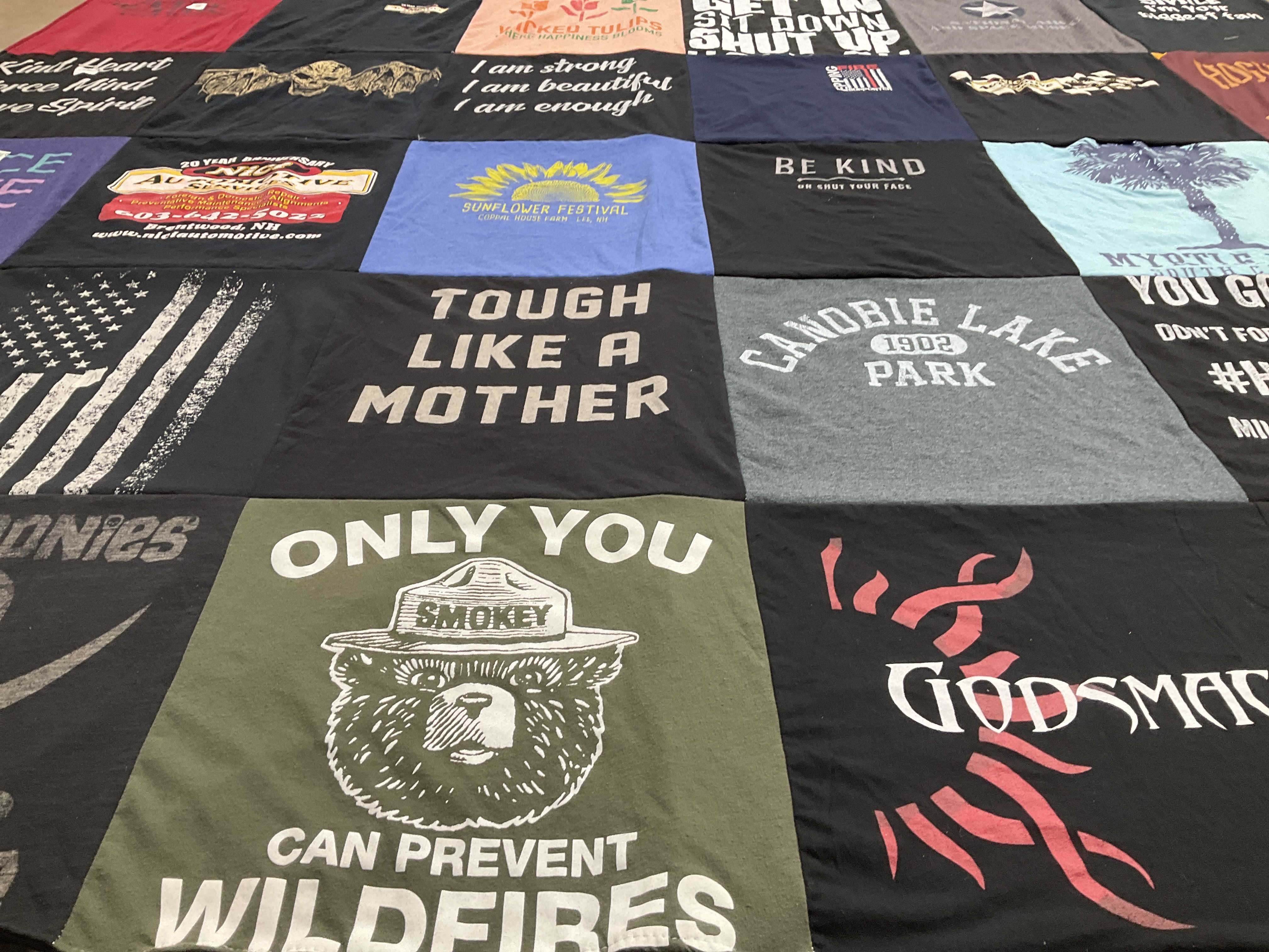 T-shirt quilt with community, nature themes by Jessica from NH