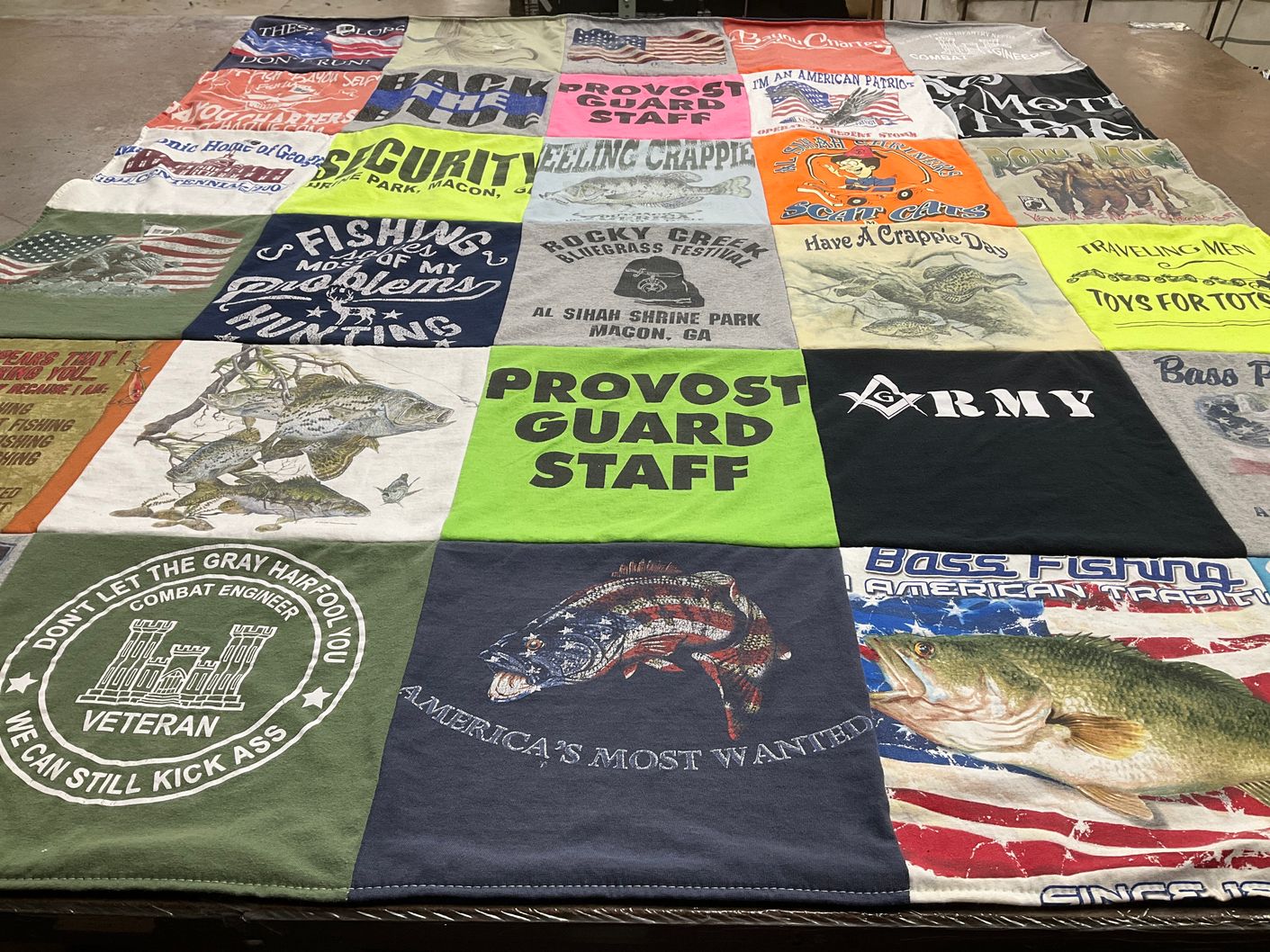T-shirt quilt with fishing, hunting themes by Pam from GA