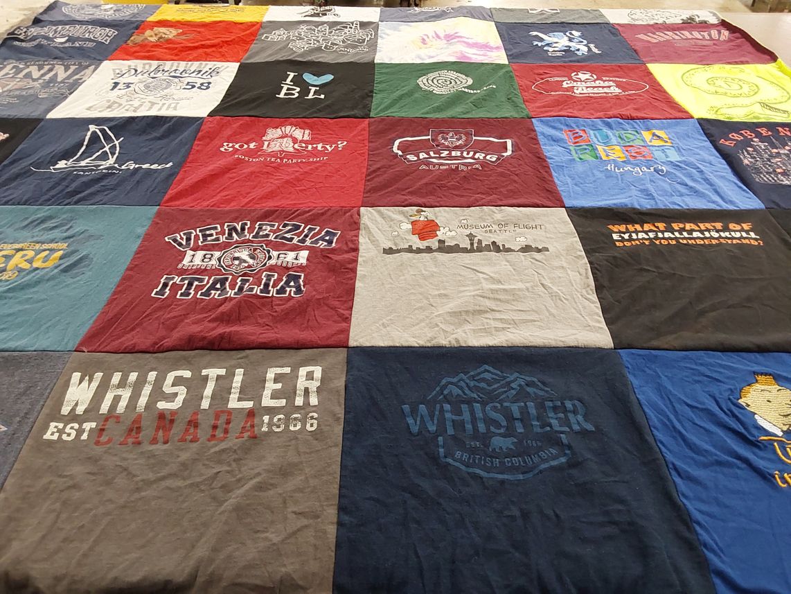 T-shirt quilt with travel, culture themes by Seema from WA