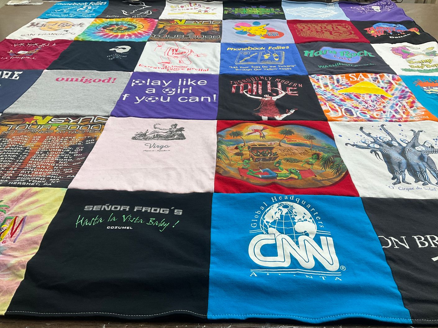 T-shirt quilt with music, travel themes by Lisa from NC
