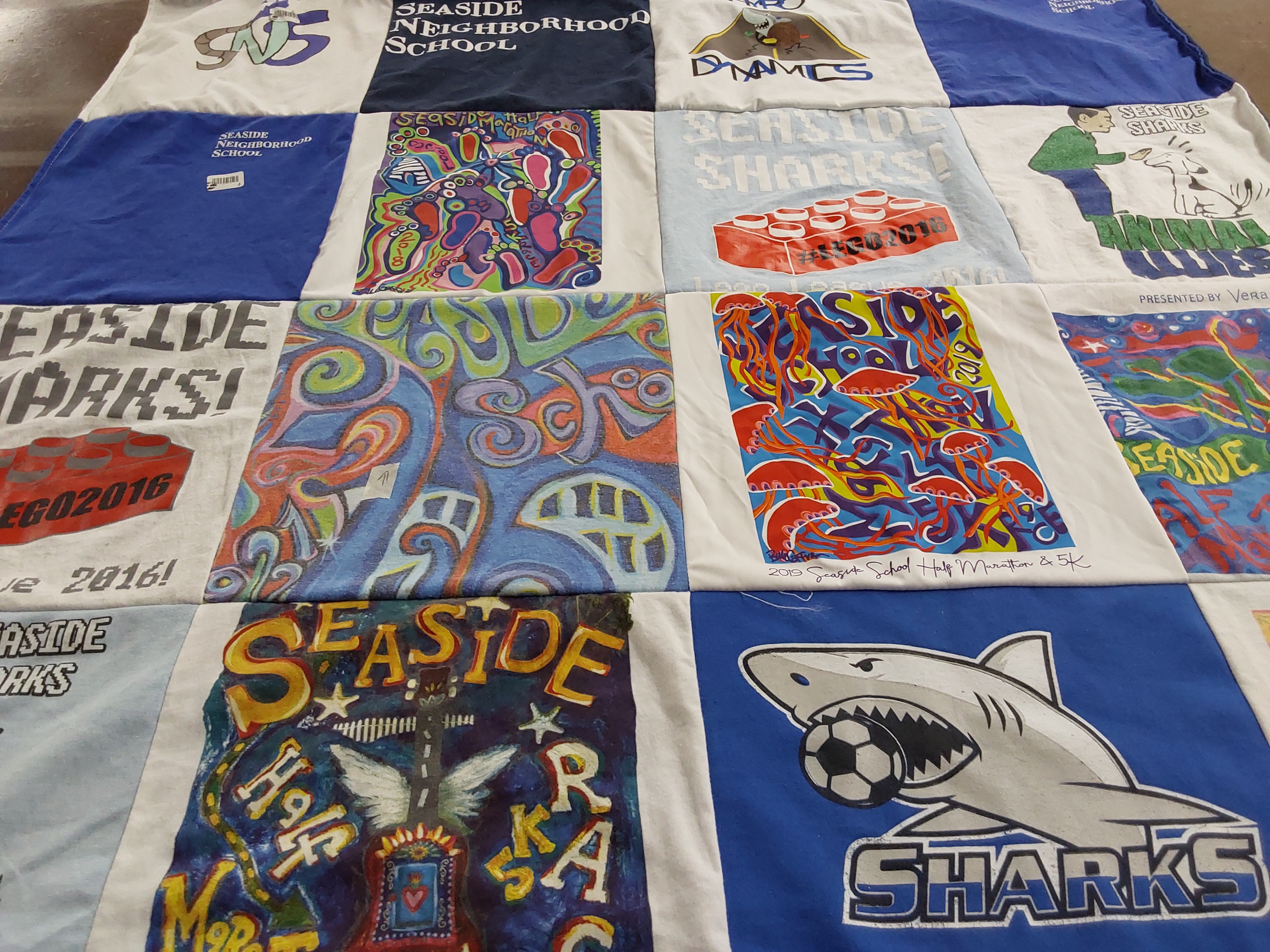 T-shirt quilt featuring seaside sharks by Allison from FL
