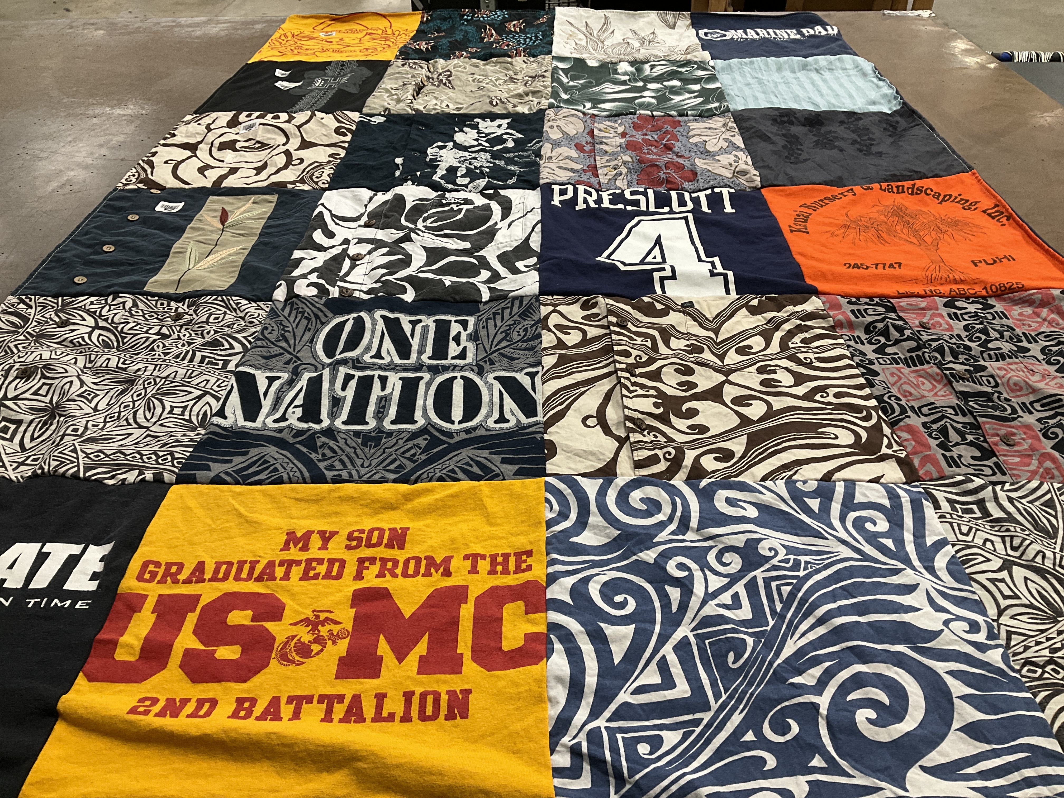 T-shirt quilt with military, landscaping themes by Brenda from HI