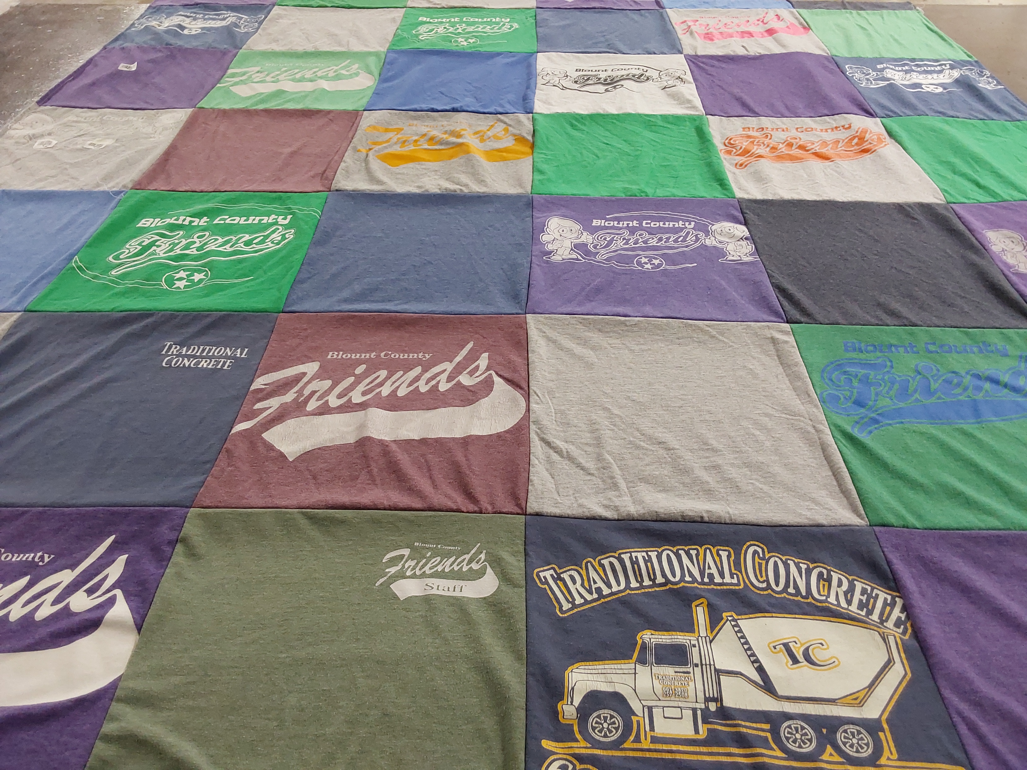 T-shirt quilt with community, friendship themes by Jill from TN