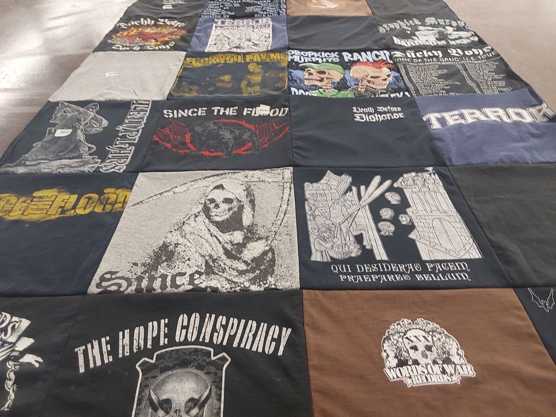 T-shirt quilt with music, skateboarding themes by BEVERLY from FL