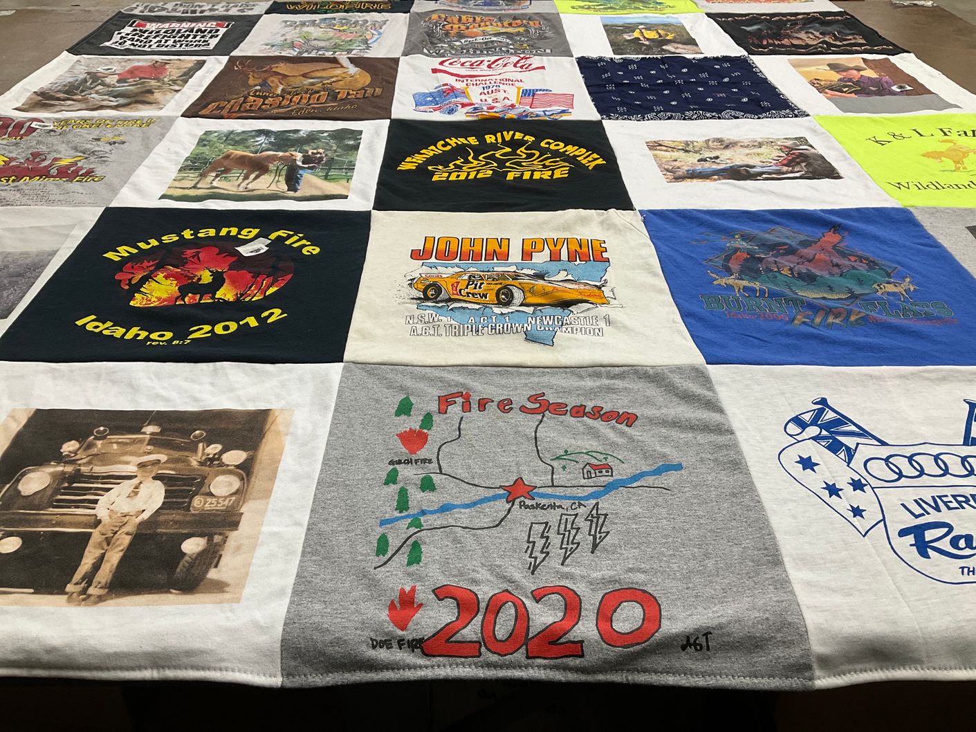 T-shirt quilt with firefighting, racing themes by Ric from OR
