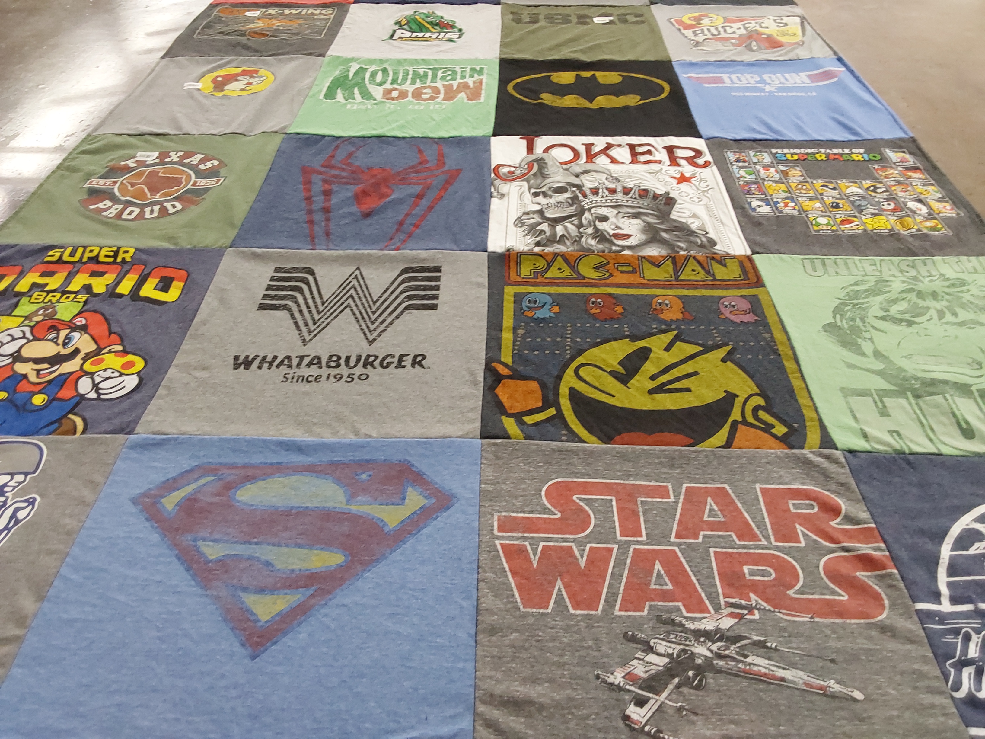 T-shirt quilt with video games, superheroes themes by Teresa from TX