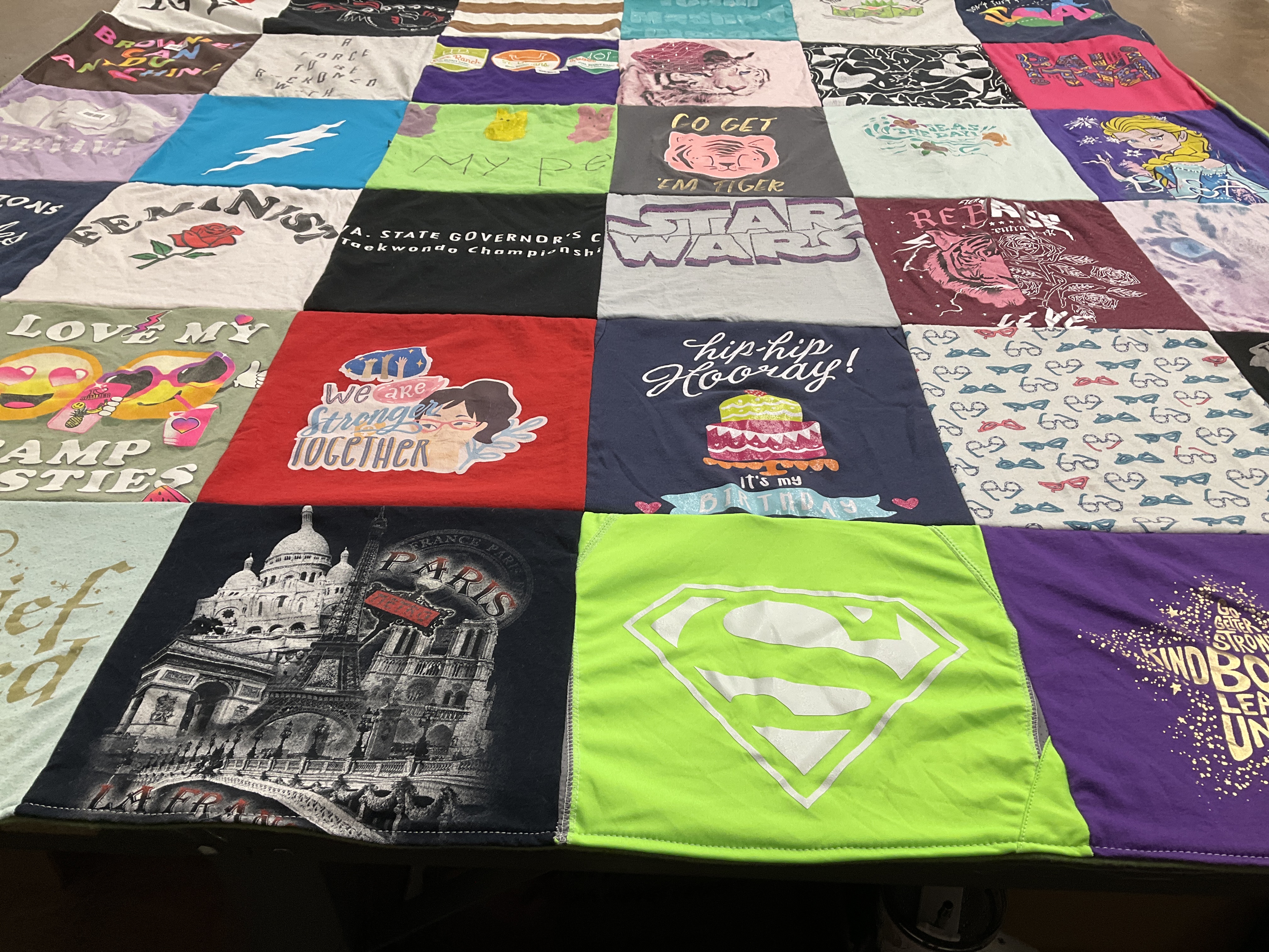 T-shirt quilt with feminism, birthdays themes by Abigail from WA