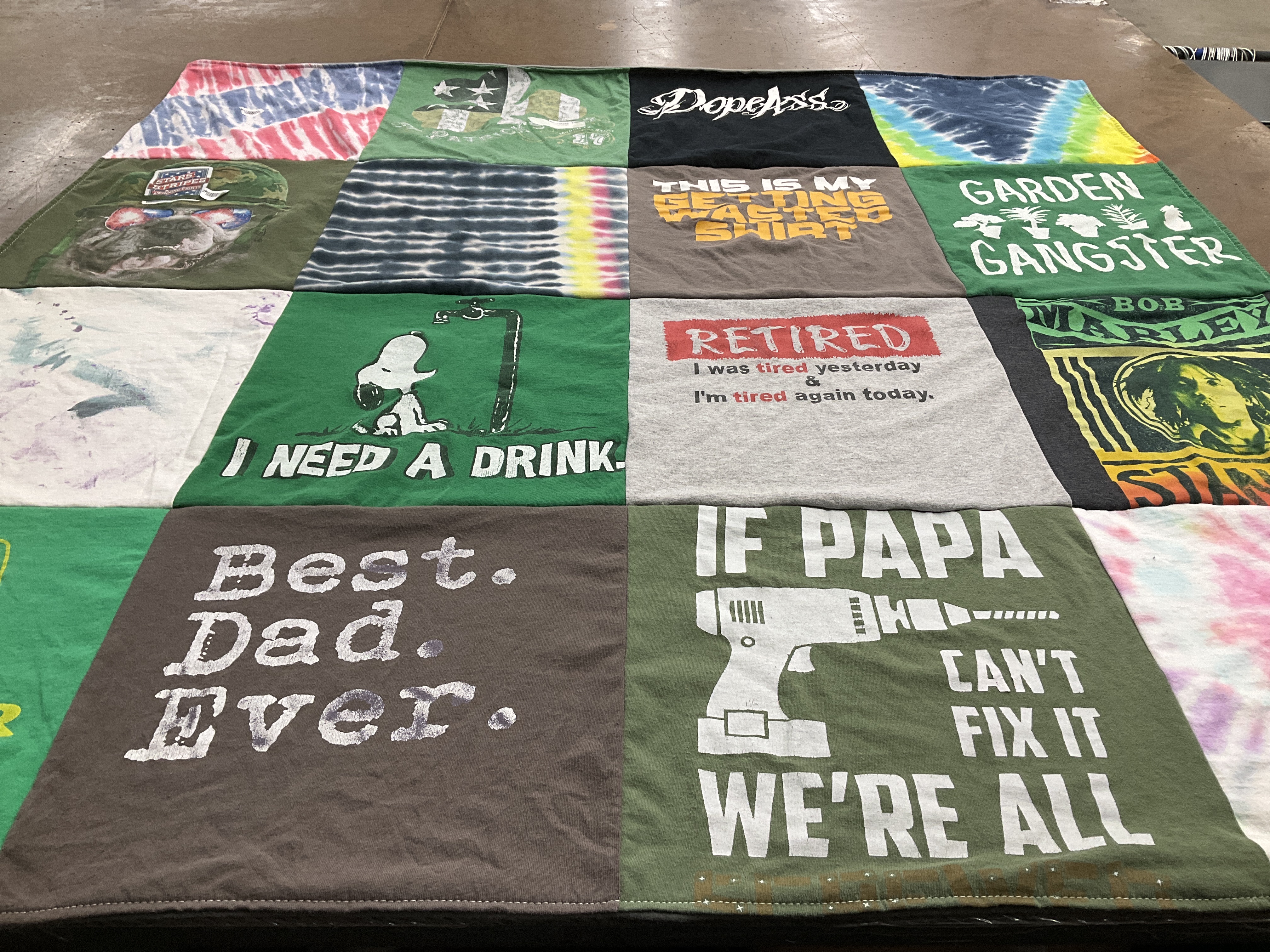 T-shirt quilt with gardening, drinking themes by Heather from NV