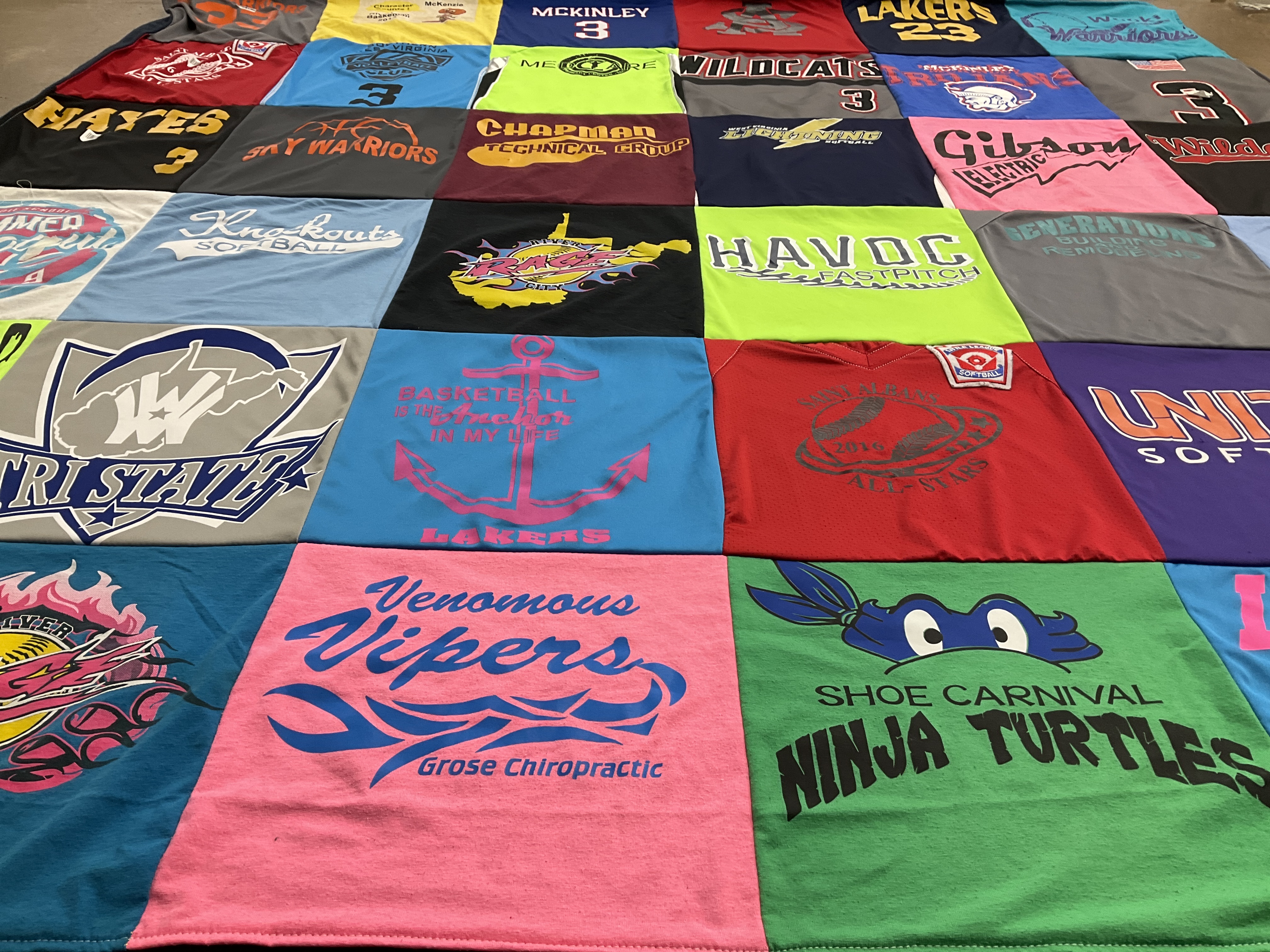 T-shirt quilt with softball, basketball themes by Joshua from WV