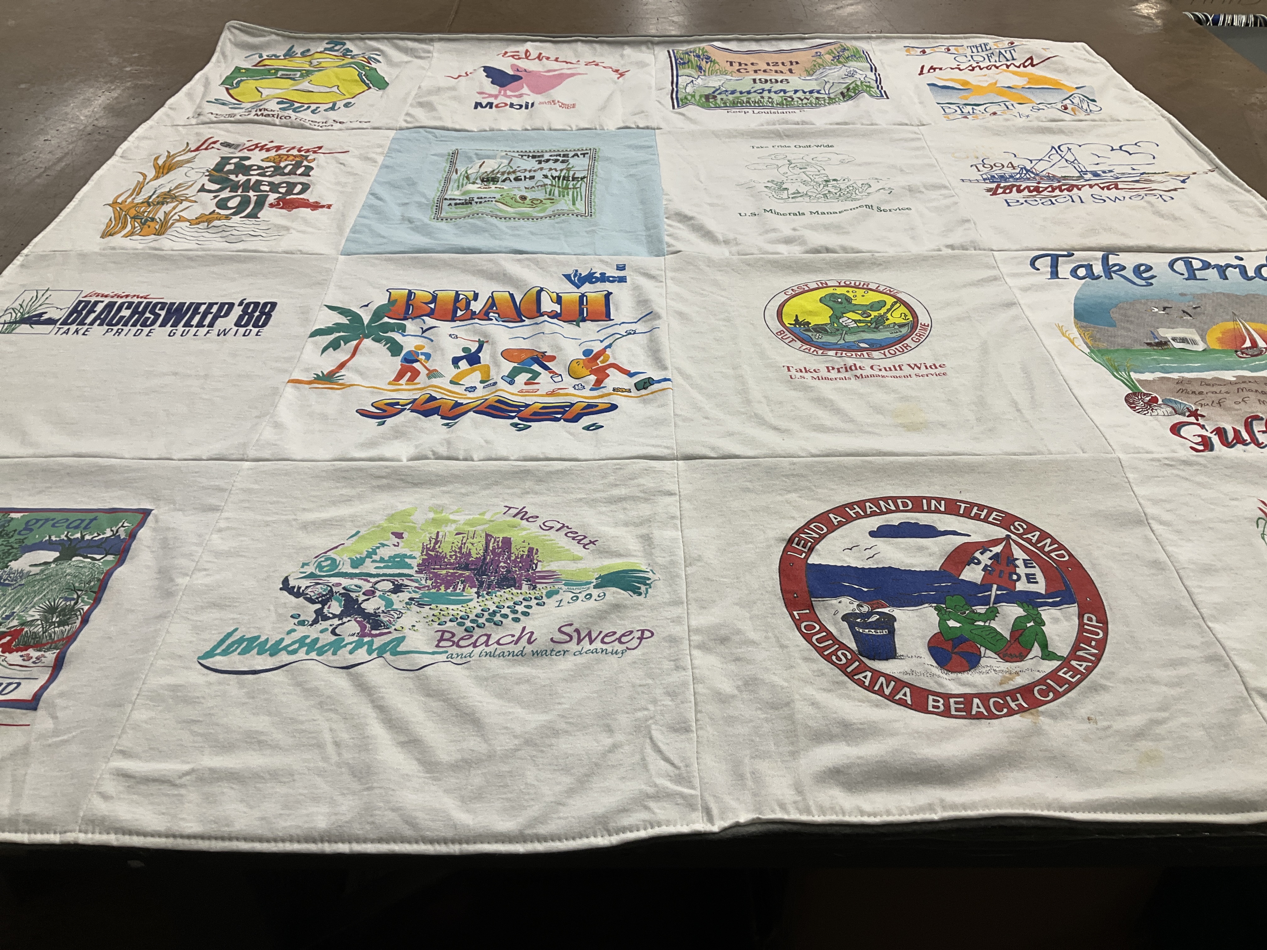 T-shirt quilt with beach cleanup, environmental awareness themes by Villere from LA