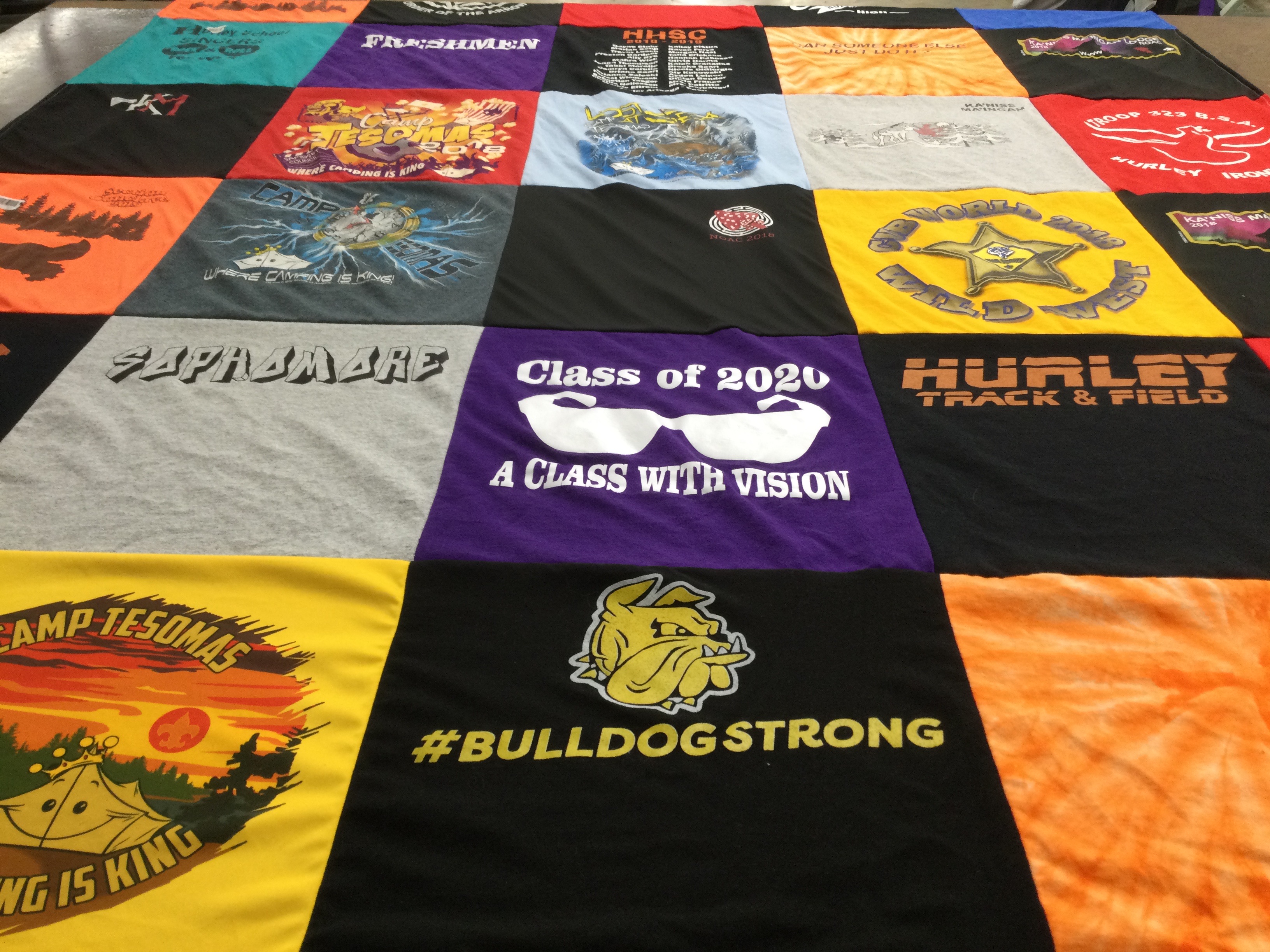T-shirt quilt with camping, education themes by Ellen from WI