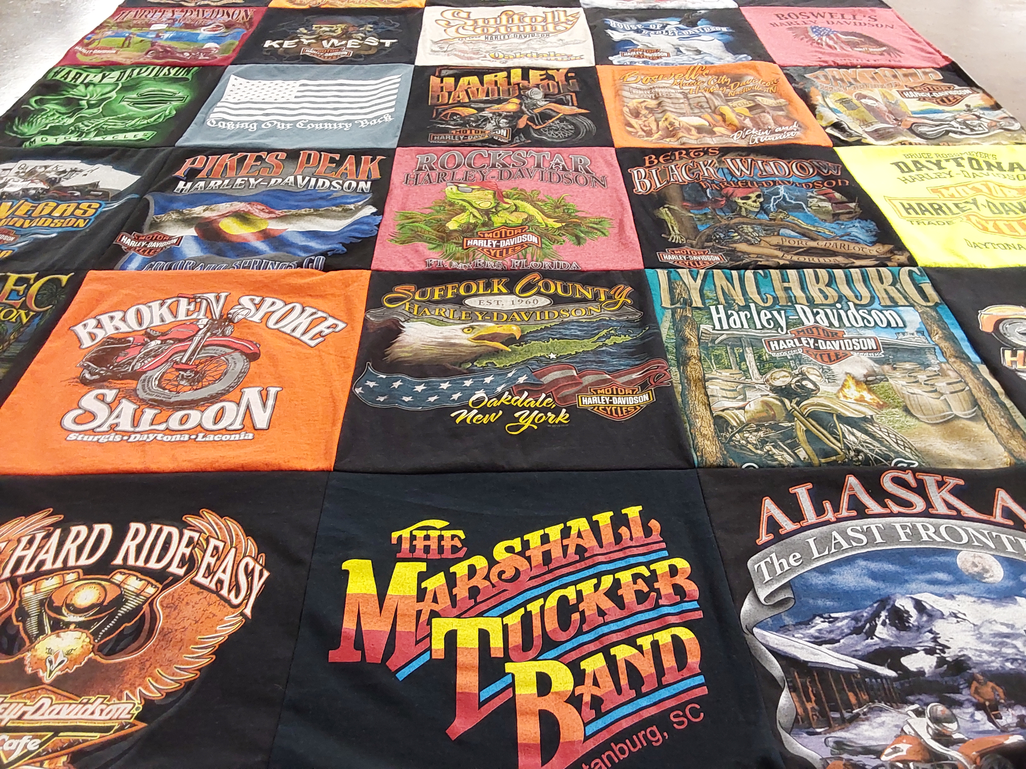 T-shirt quilt with motorcycles, music themes by Thomas from FL