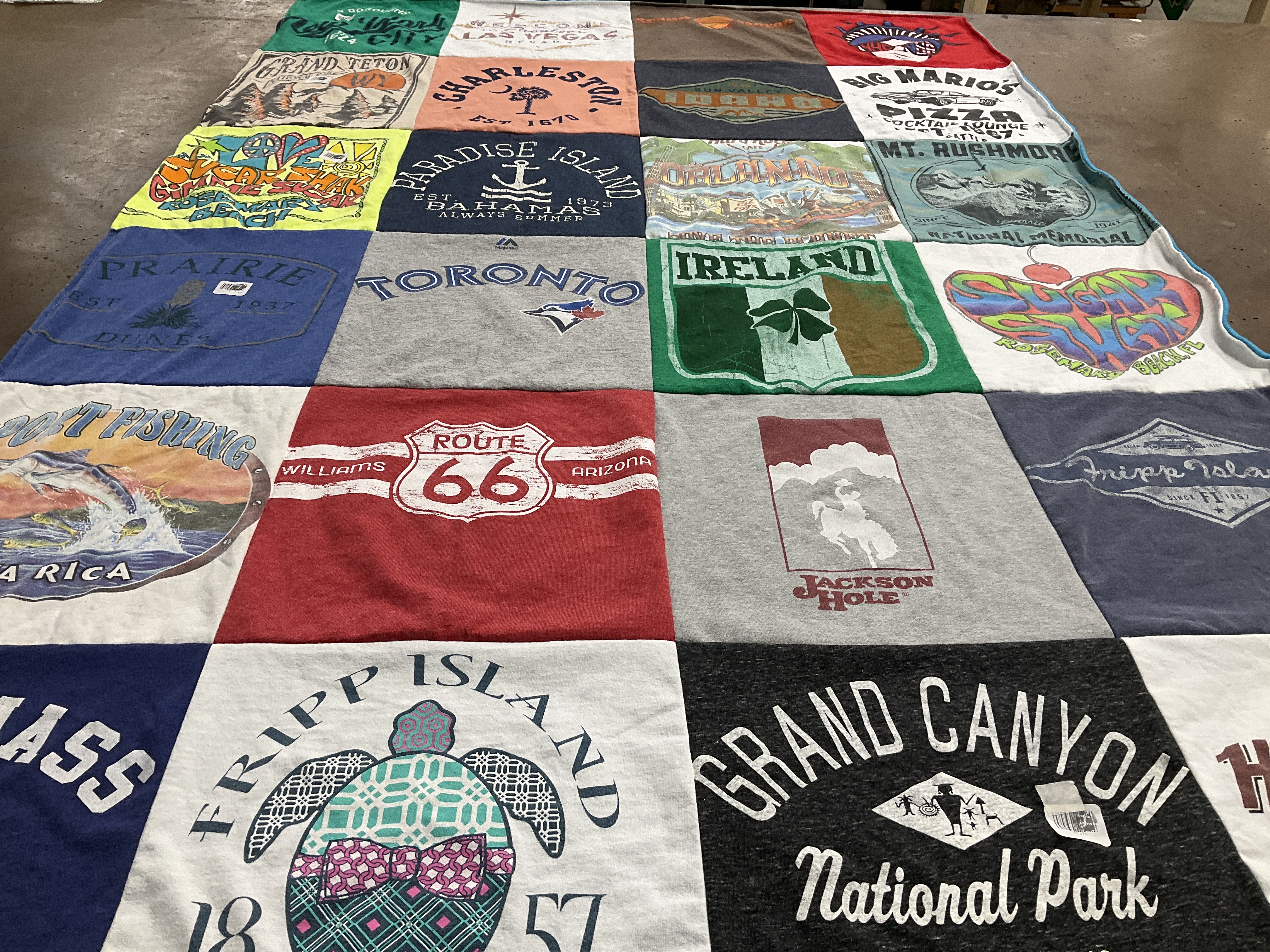 T-shirt quilt with travel, vacation themes by Kellie from TX