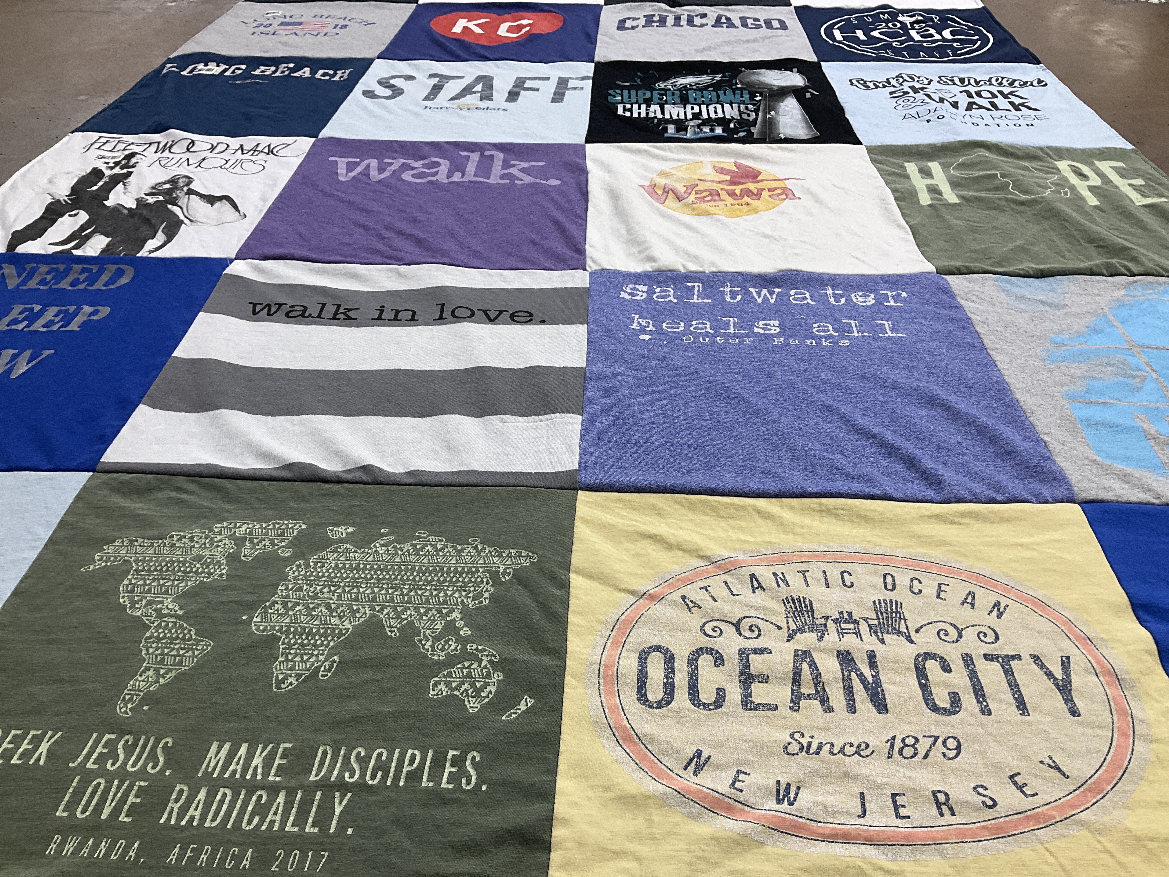 T-shirt quilt with travel, music themes by Holly from PA