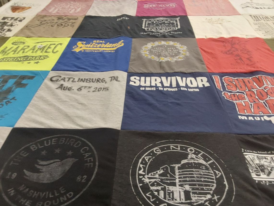 T-shirt quilt with travel, outdoor activities themes by Kaylin from IL