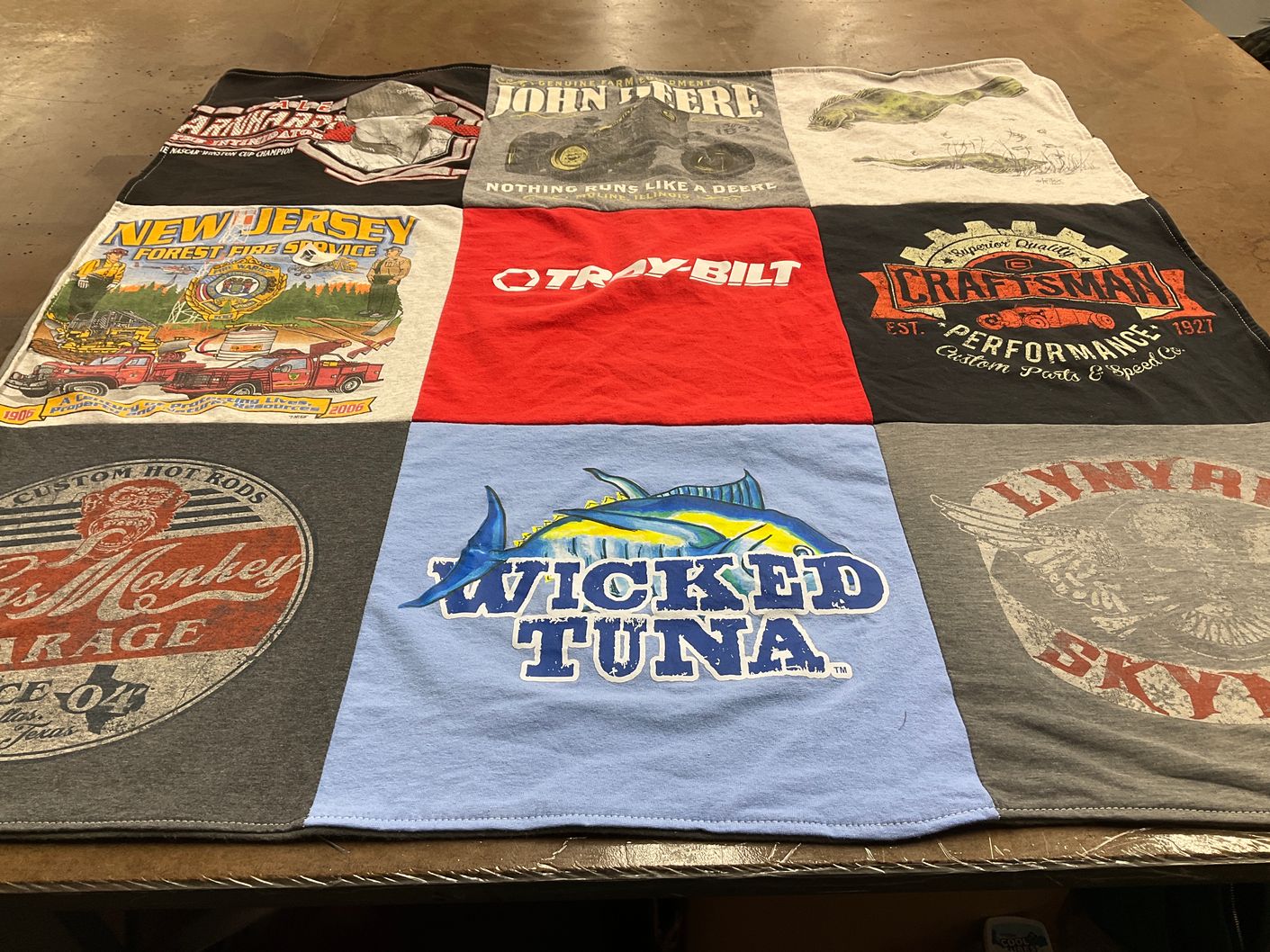 T-shirt quilt with forestry, firefighting themes by KIm from NJ