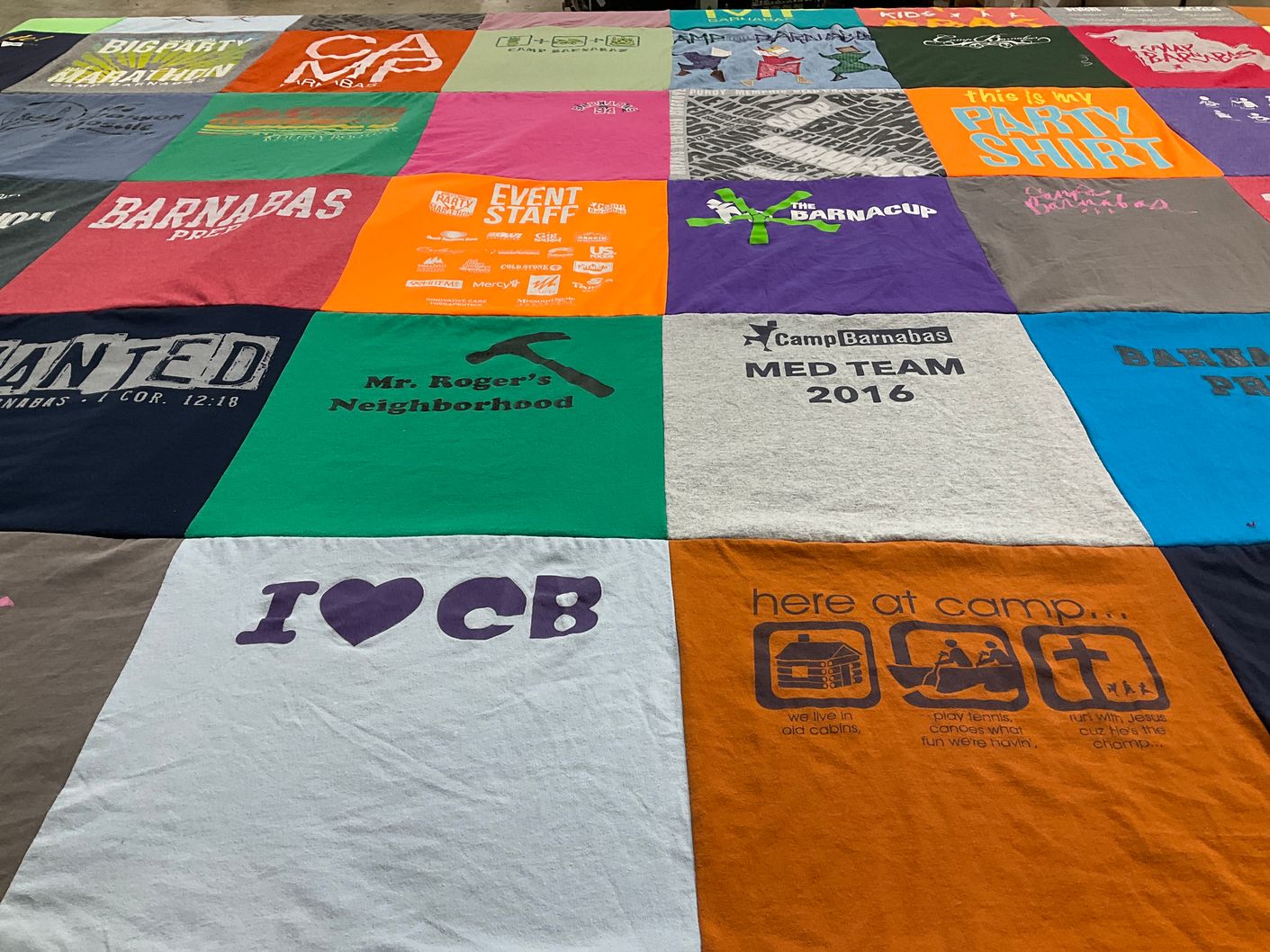 T-shirt quilt with camping, neighborhood activities themes by Jenna from WA