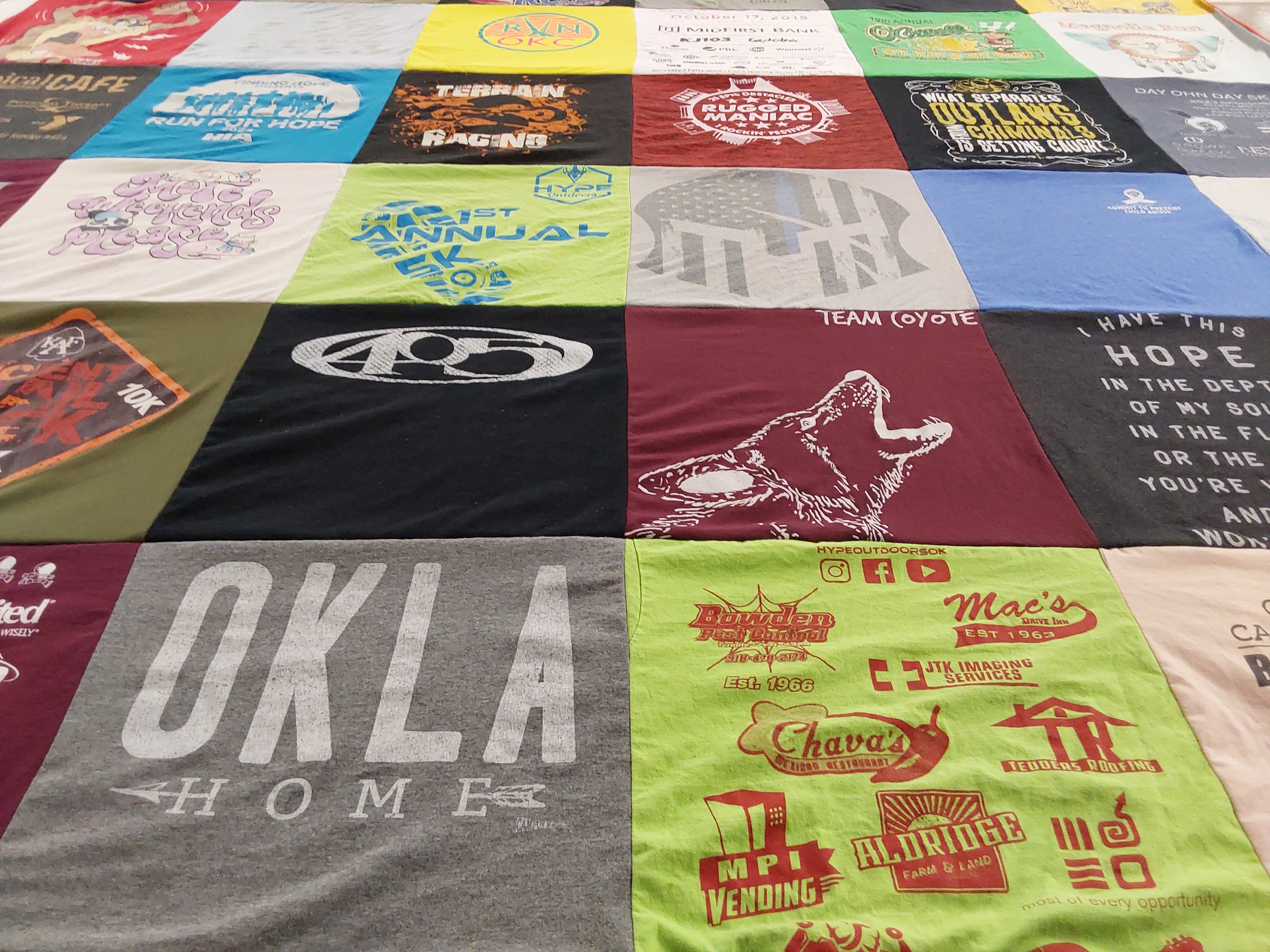 T-shirt quilt with running, outdoors themes by Janet from OK