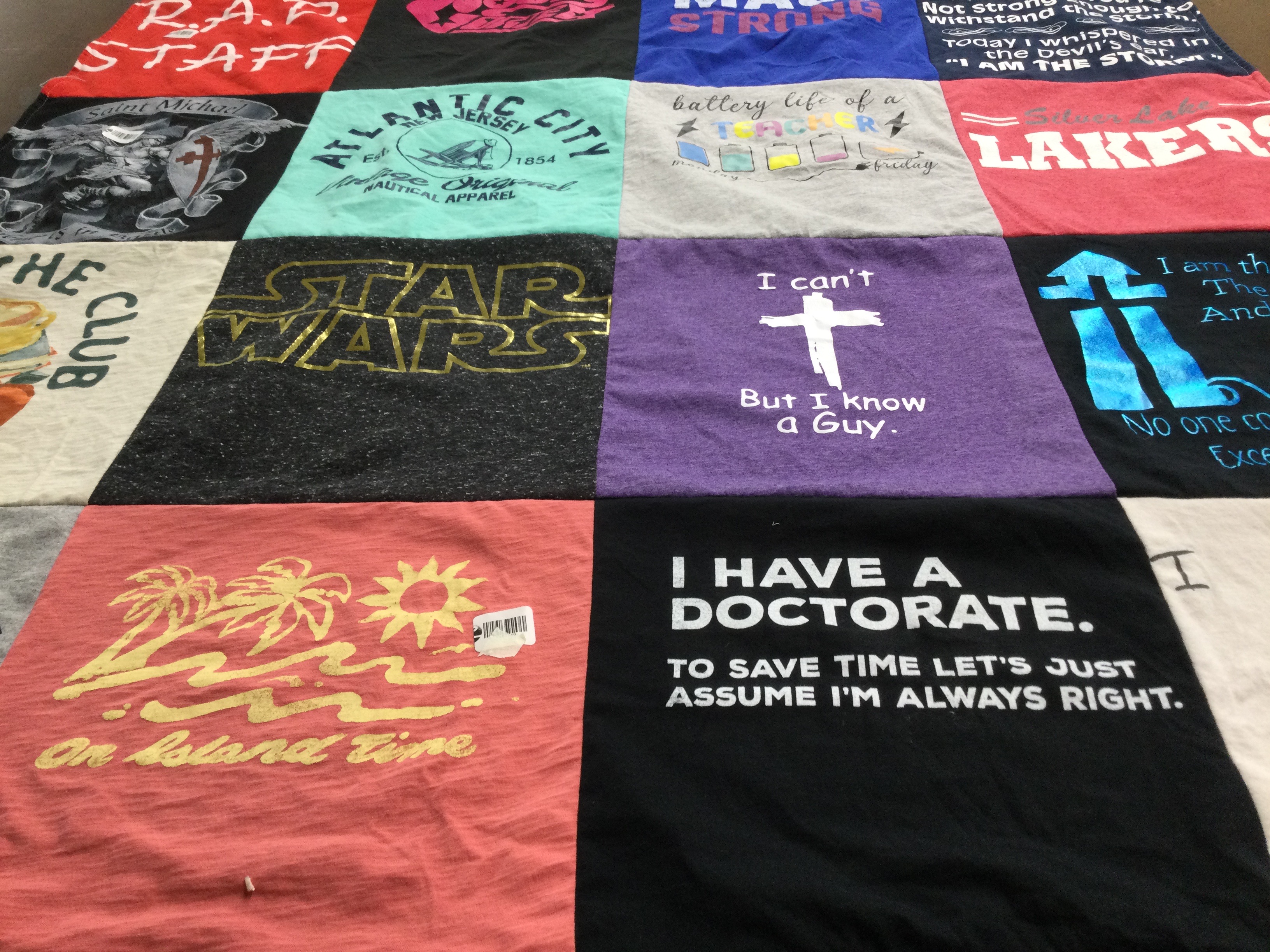T-shirt quilt with teaching, travel themes by Robin from MA