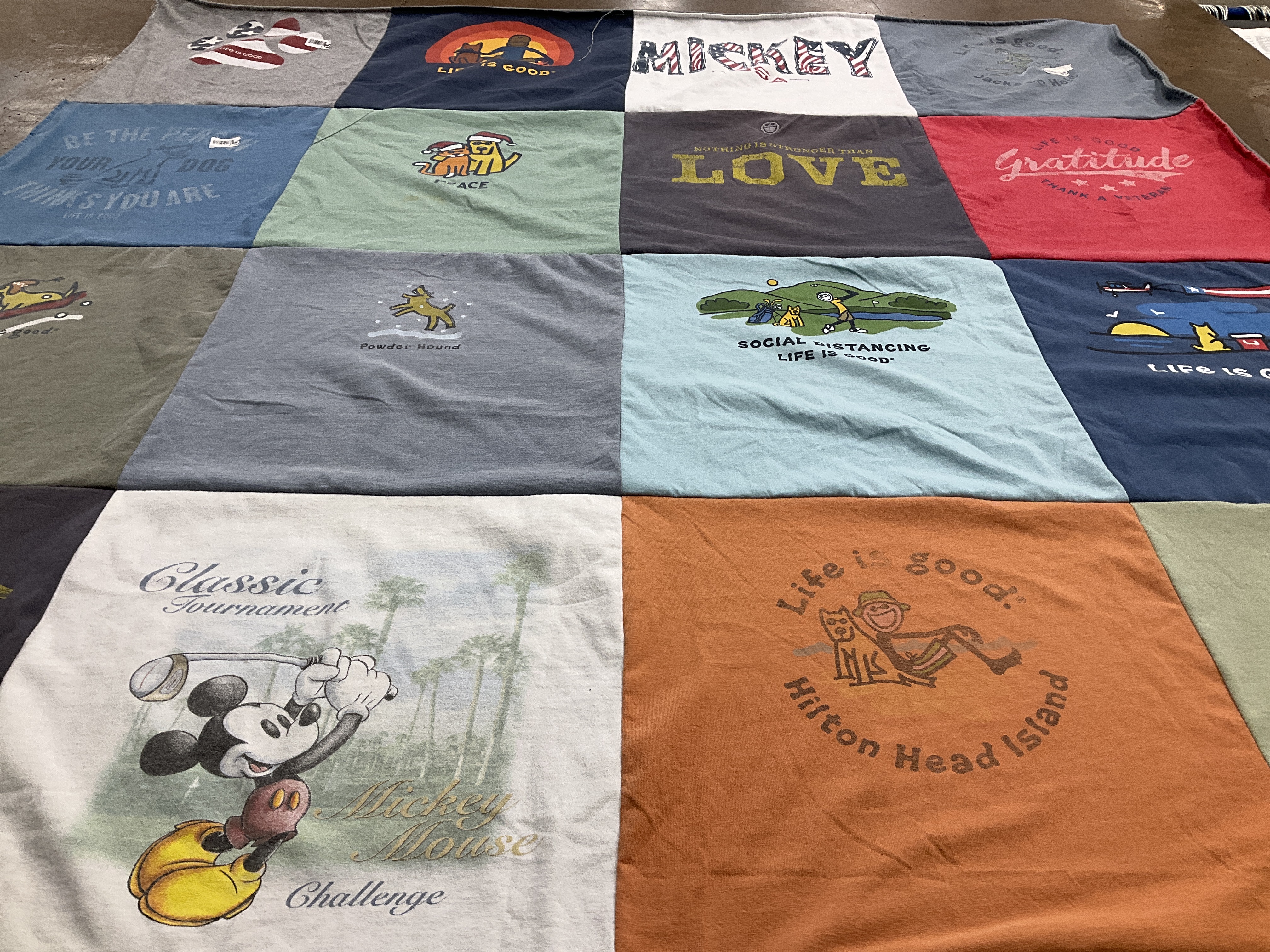 T-shirt quilt with disney, dogs themes by Kim from SC