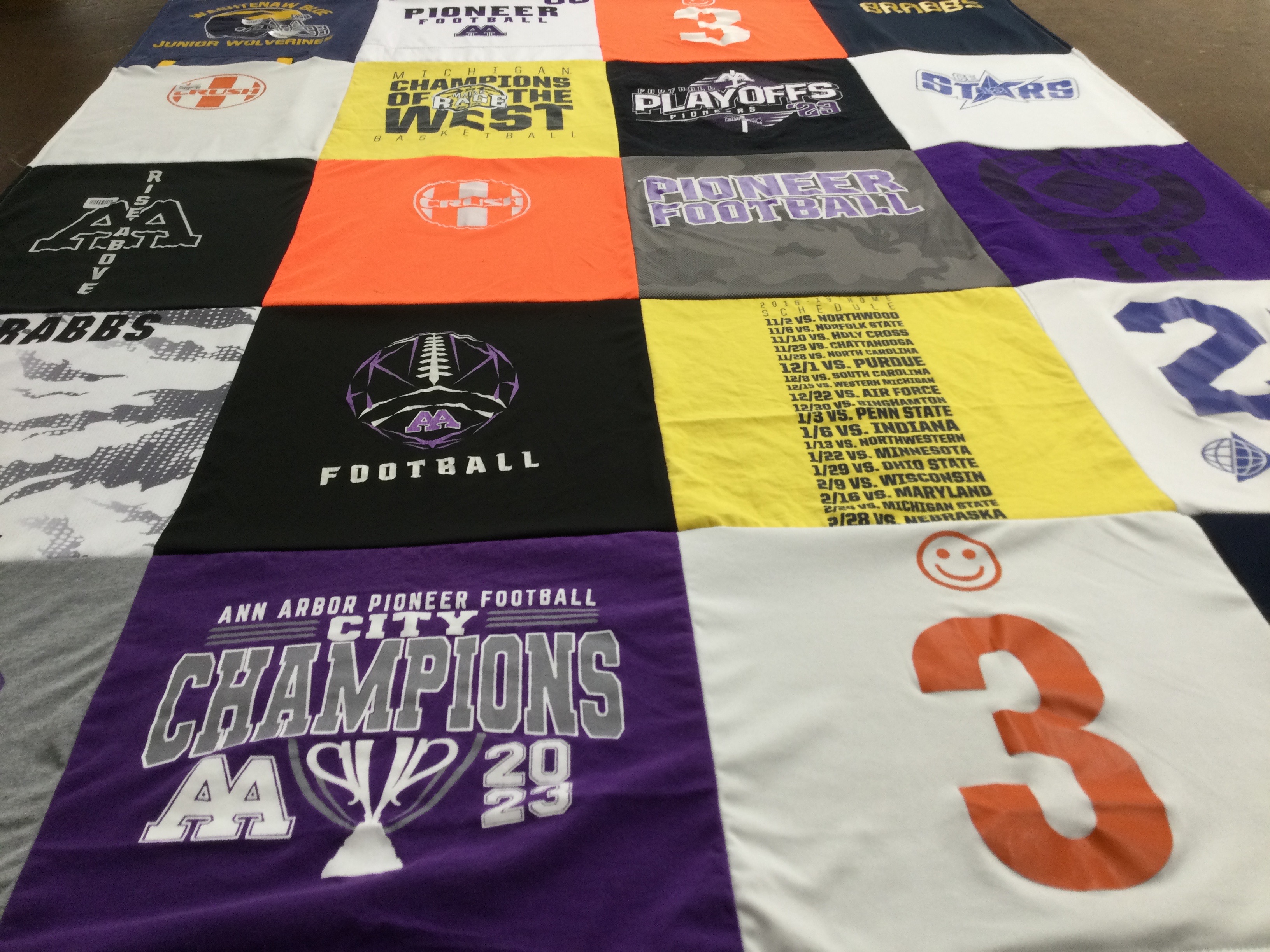 T-shirt quilt featuring ann arbor pioneer football by Catherine from MI