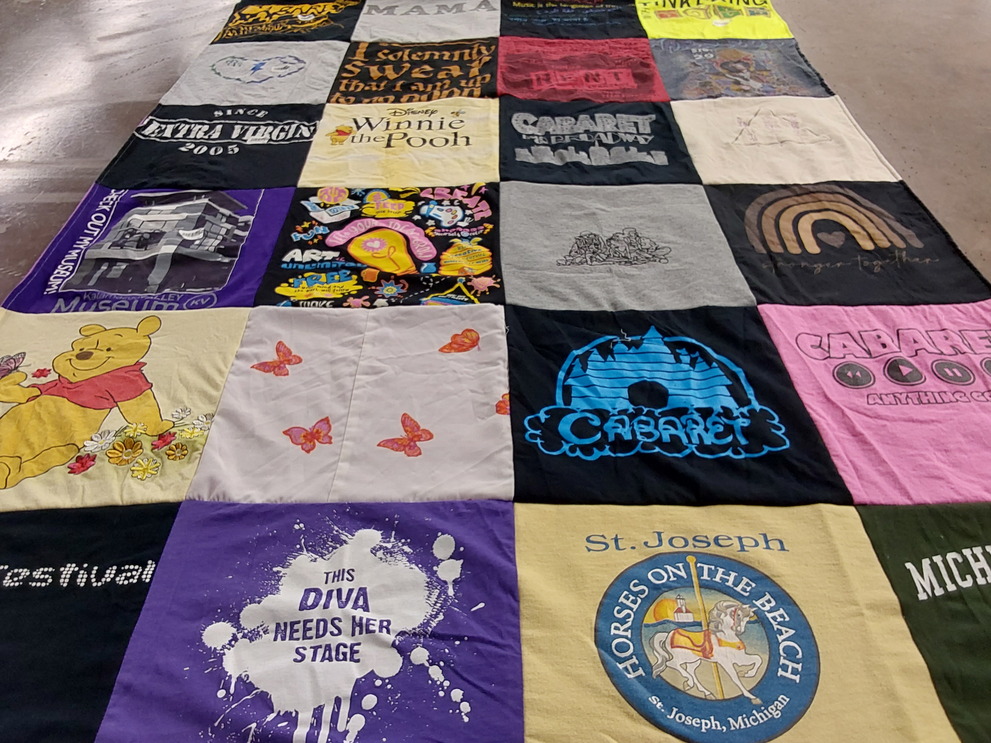 T-shirt quilt with theater, music themes by Caylee from MI