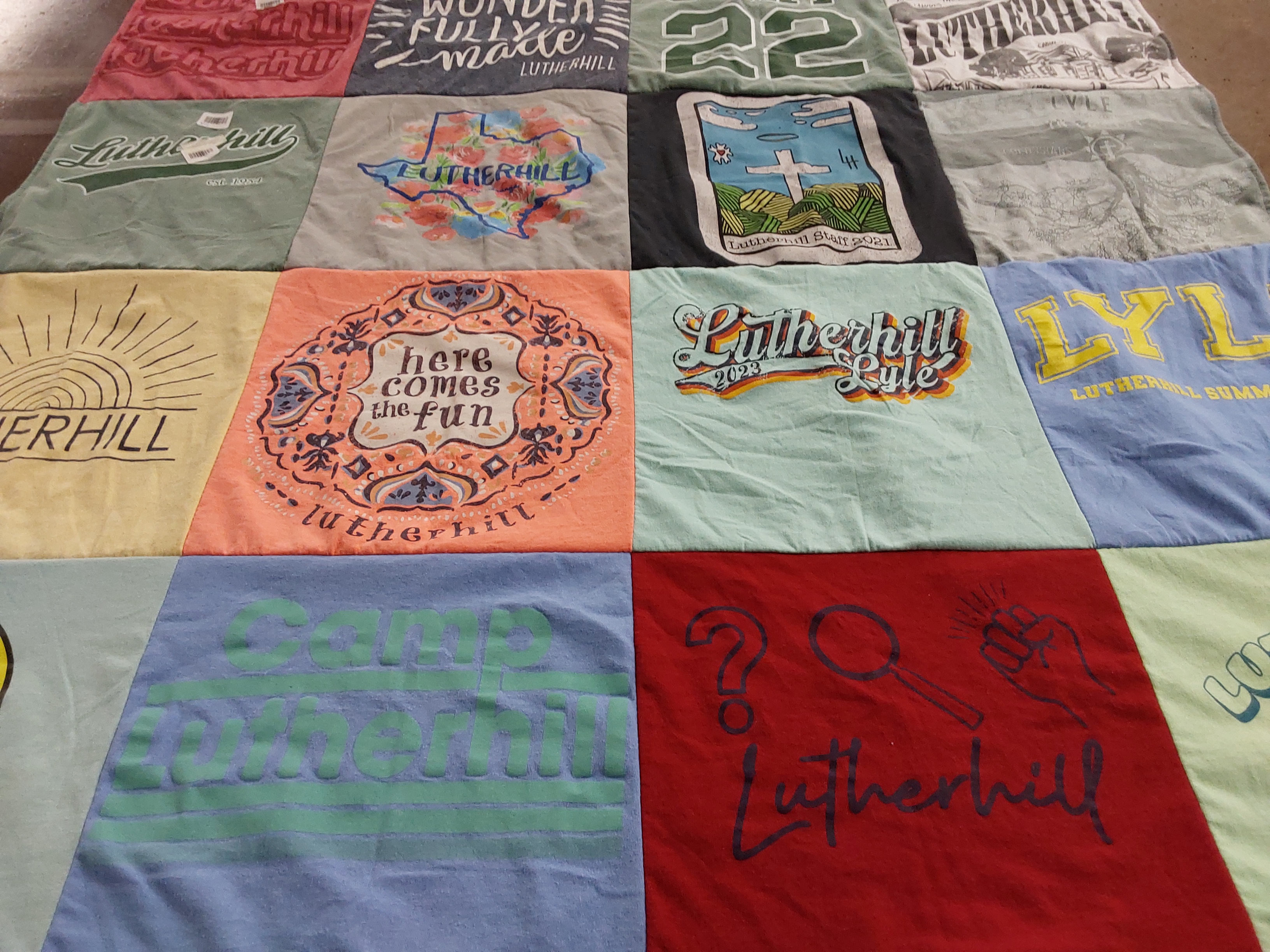 T-shirt quilt with camping, outdoor activities themes by Jennifer from TX