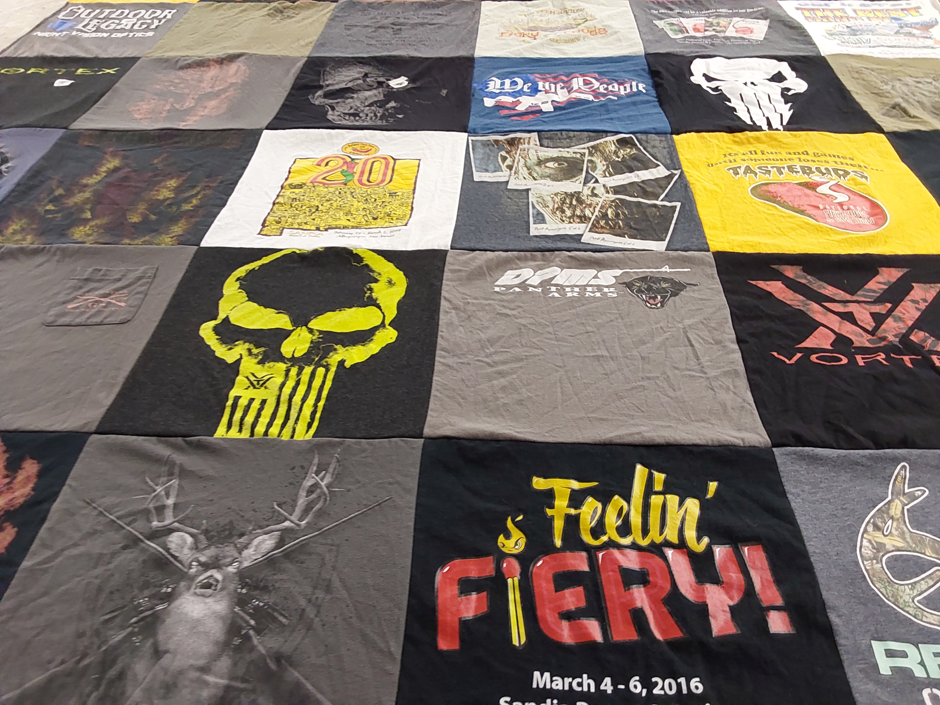 T-shirt quilt with outdoor activities, hunting themes by Raundra from TX