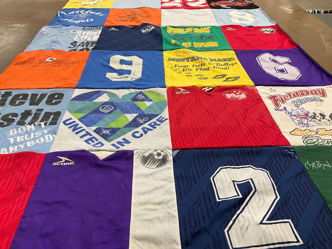 T-shirt quilt featuring score by Lisa from FL