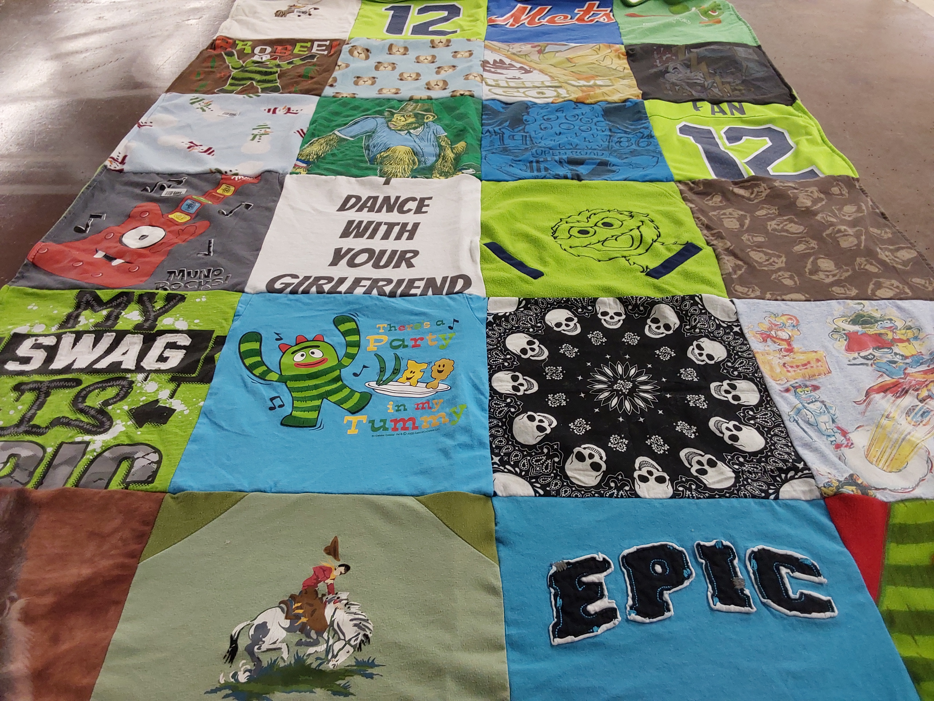 T-shirt quilt with sports, music themes by Tonya from NE