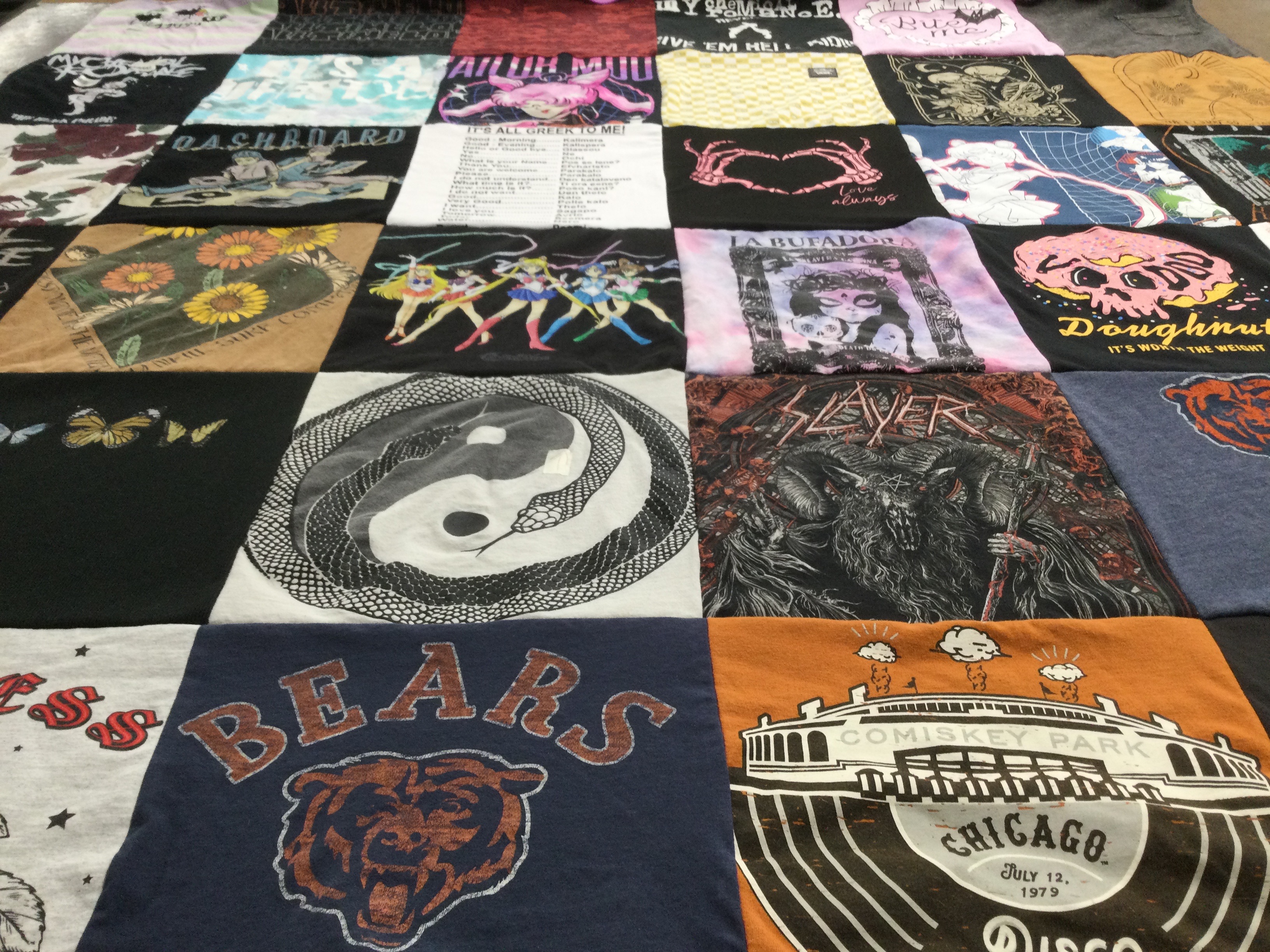 T-shirt quilt with music, art themes by Christina from NV