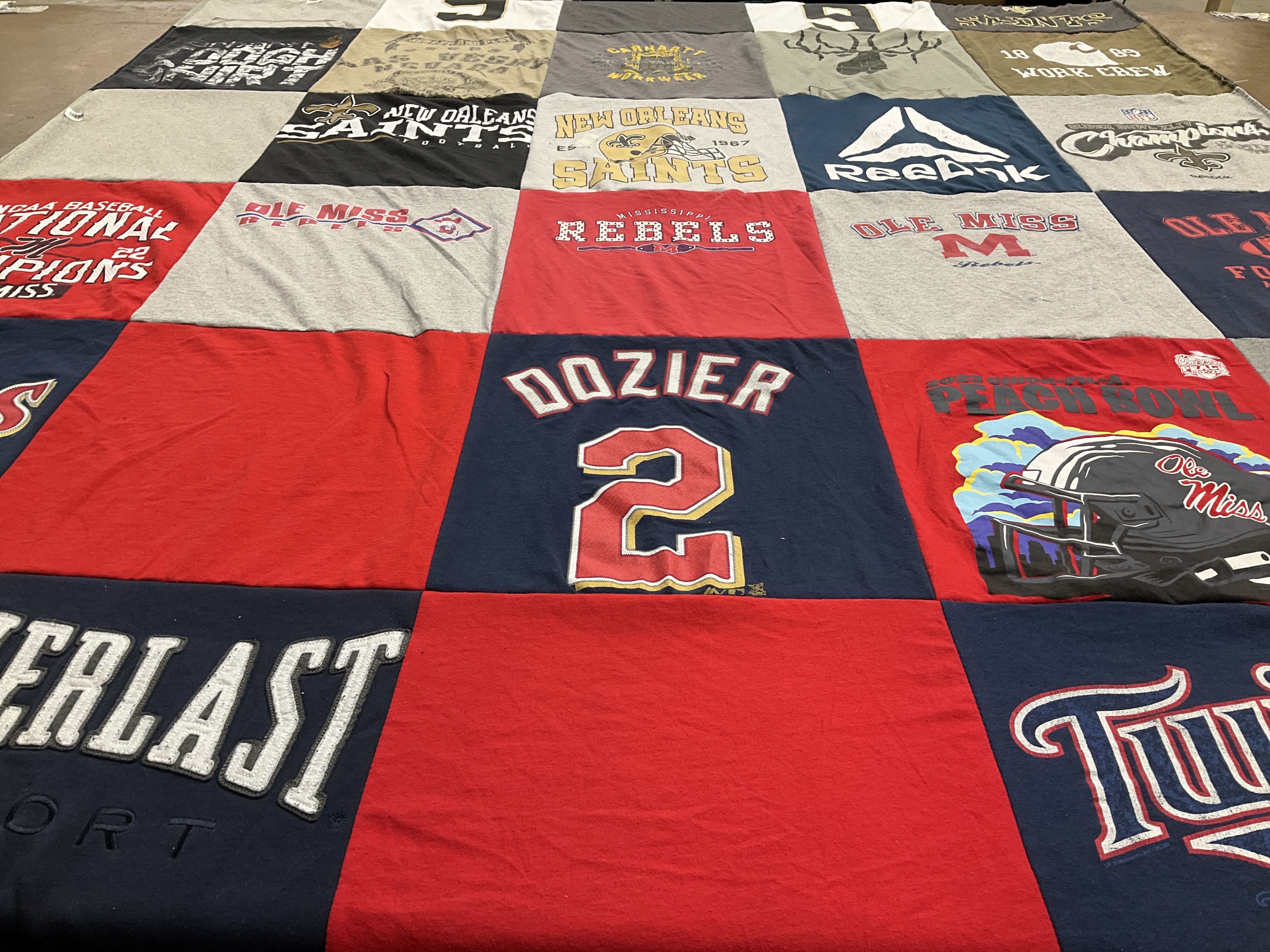 T-shirt quilt featuring new orleans saints, ole miss rebels by Angie from ND