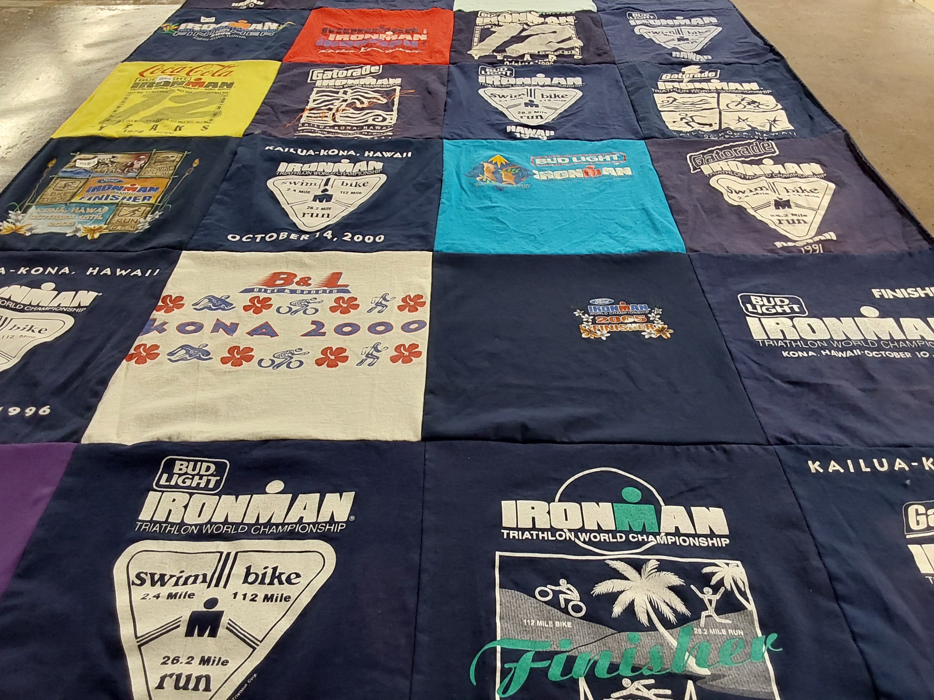 T-shirt quilt with triathlons, fitness themes by Laurie from FL