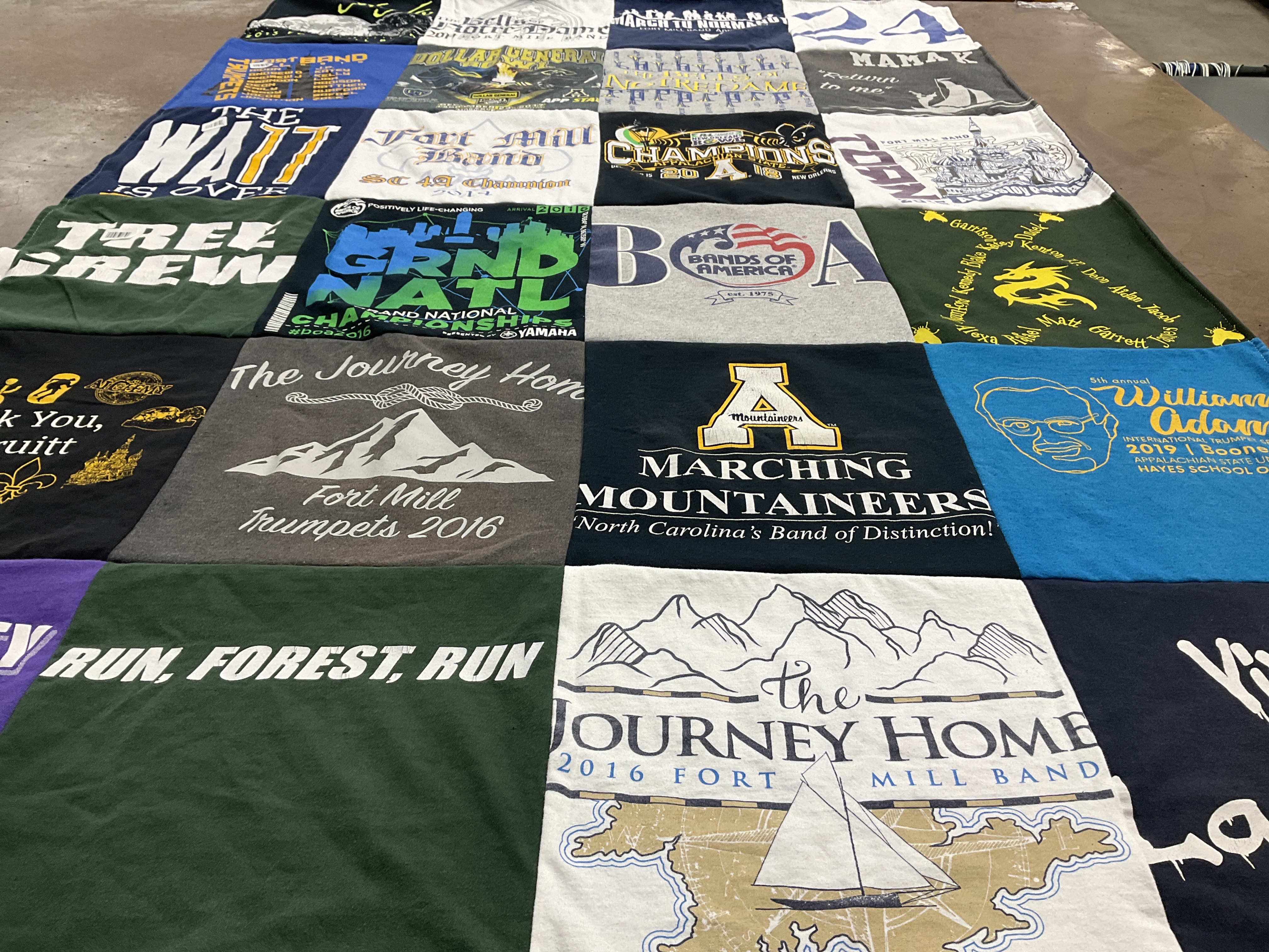 T-shirt quilt featuring fort mill trumpets, marching mountaineers by Daryl from SC
