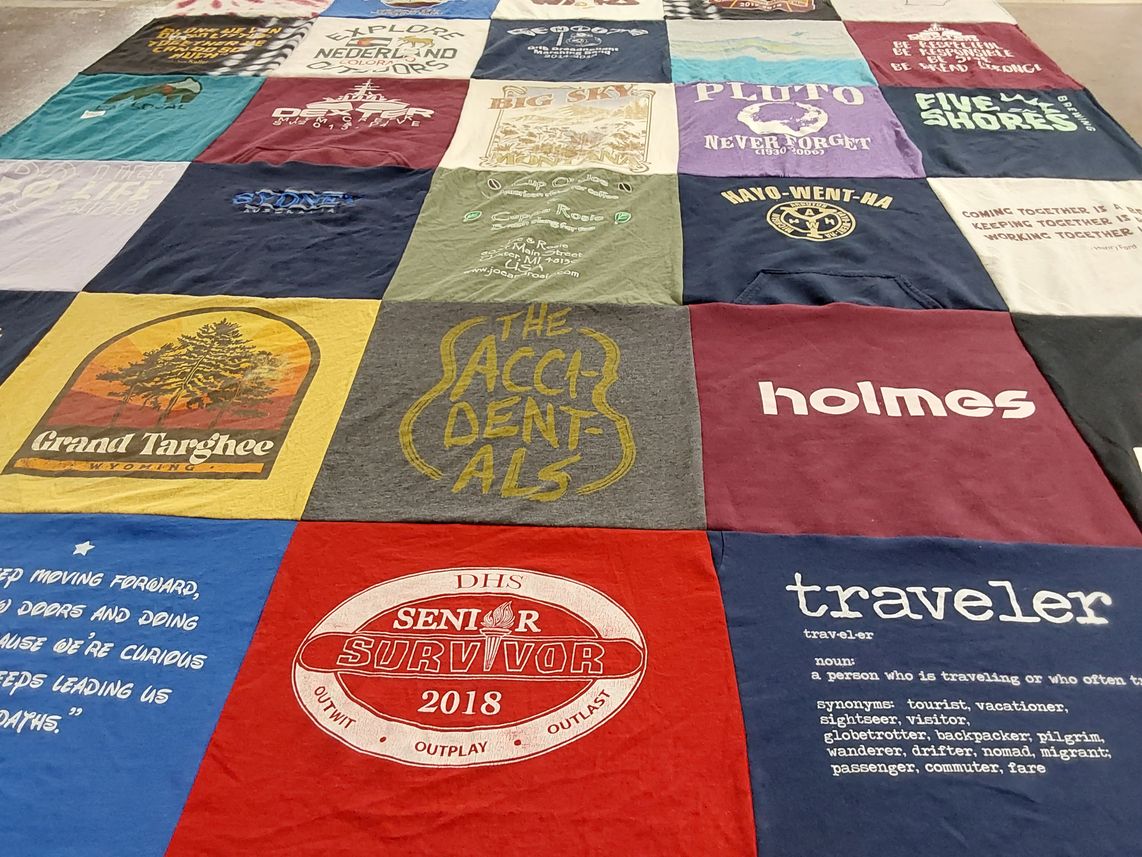 T-shirt quilt with traveling, vacationing themes by Sharon from MI