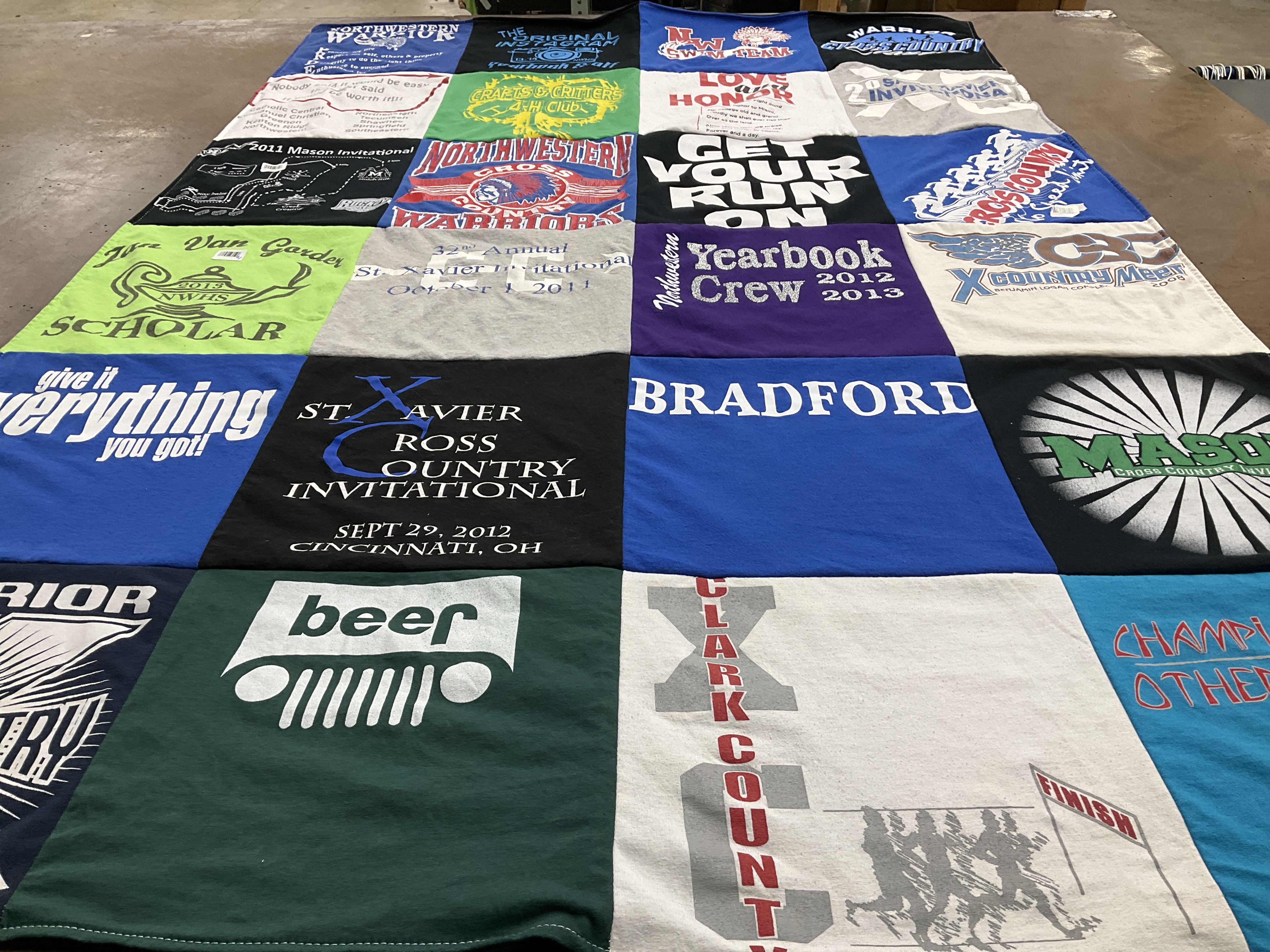 T-shirt quilt featuring northwestern cross country team by Megan from OH
