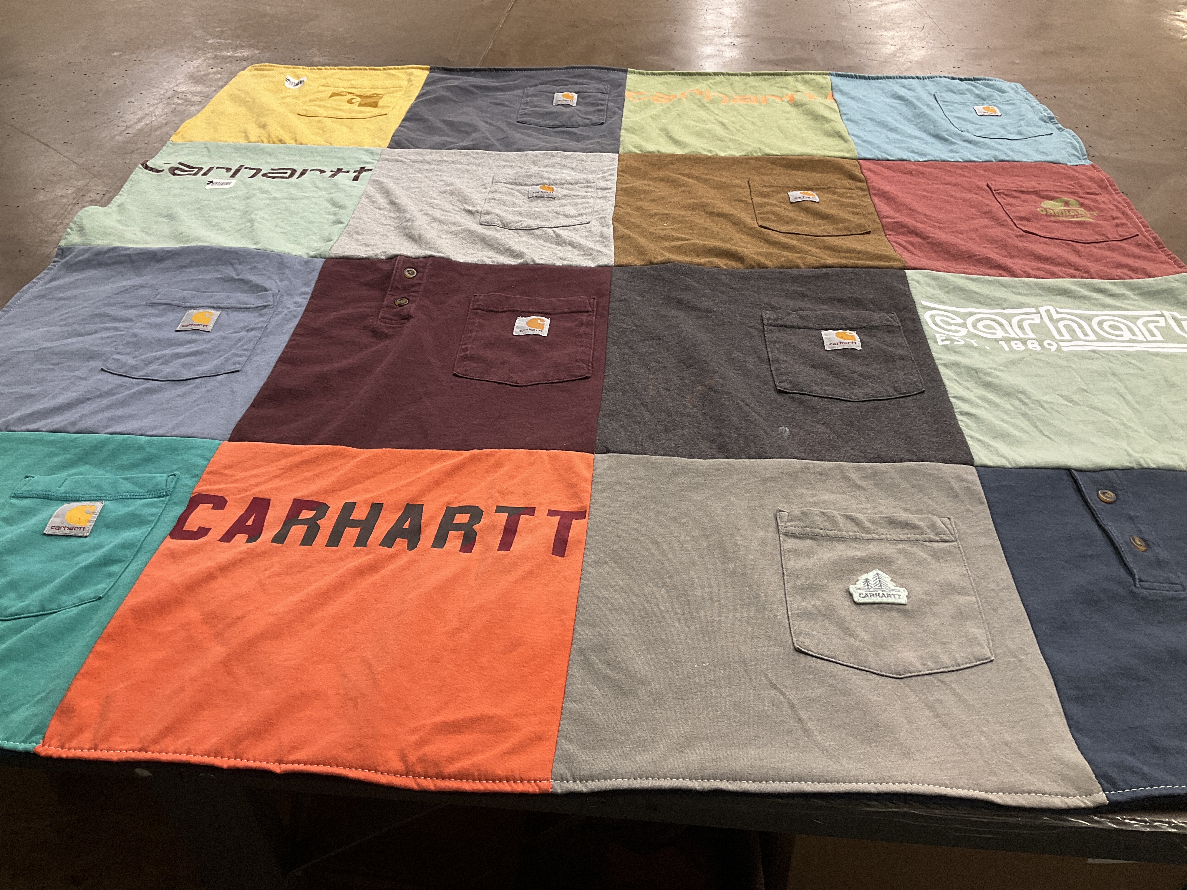 T-shirt quilt with outdoor activities, workwear themes by Robin from CT