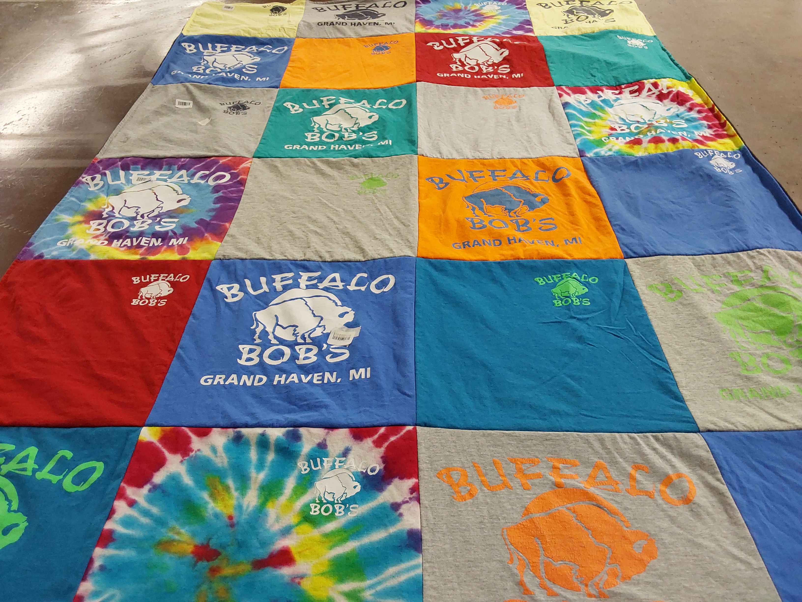 T-shirt quilt with food, restaurants themes by Victoria from IL