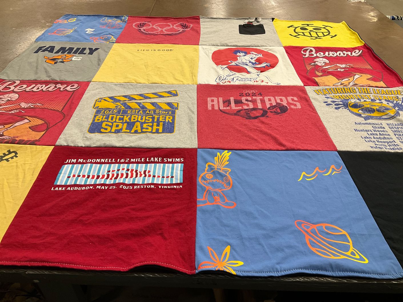 T-shirt quilt with swimming themes by Nora from VA
