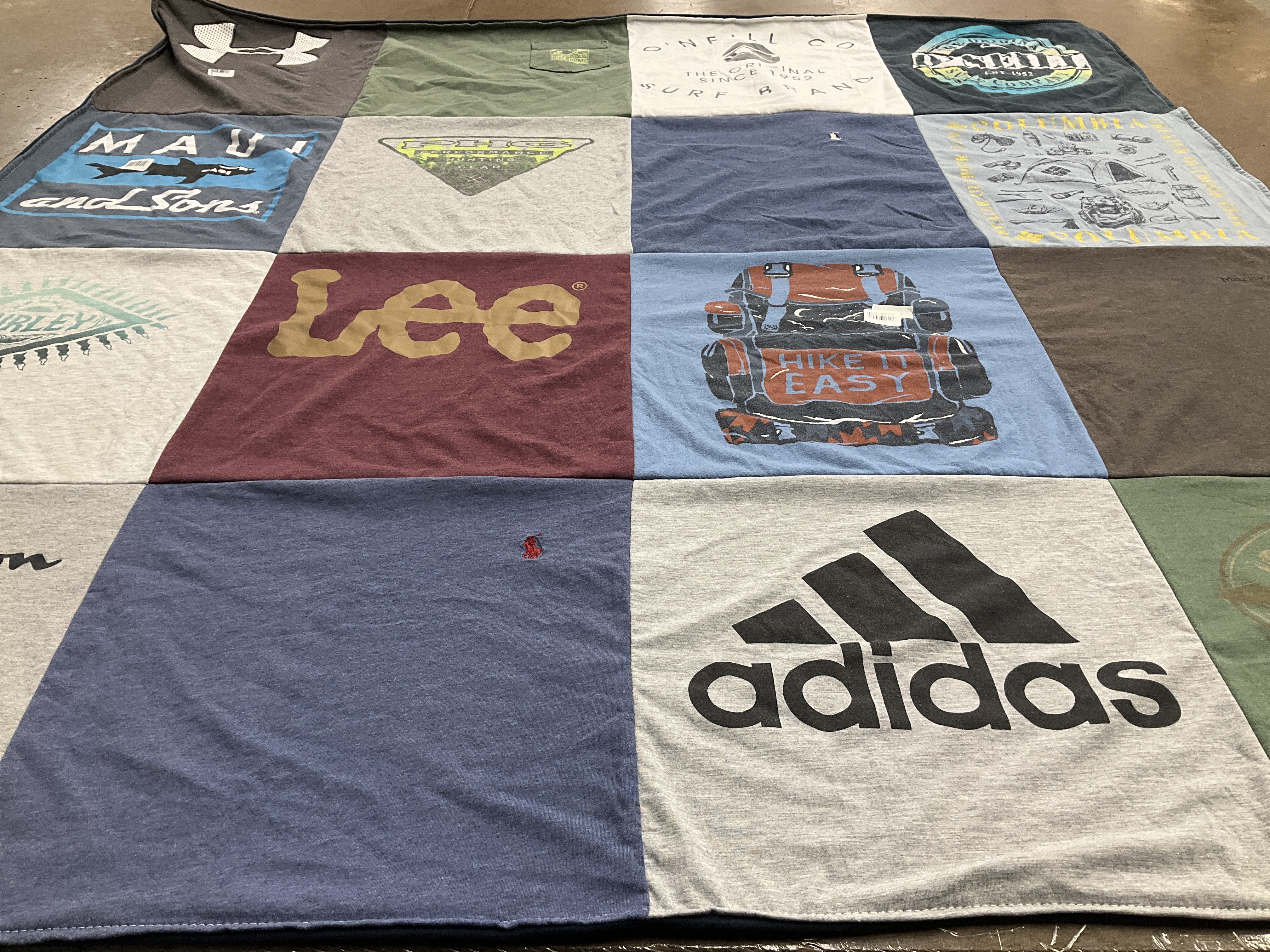 T-shirt quilt with sur surfing, hiking themes by Thomas from CA