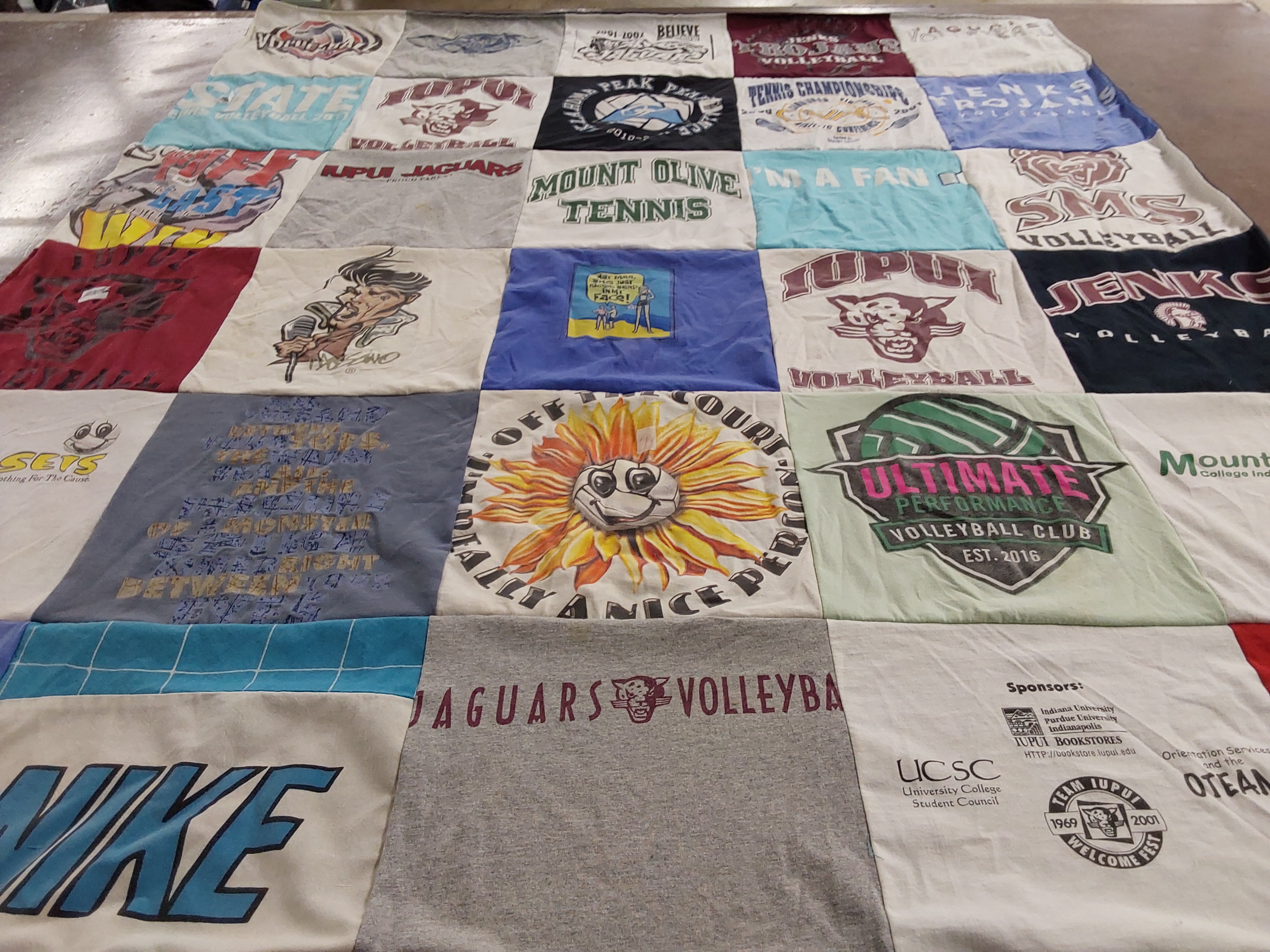 T-shirt quilt featuring kokomo jaguars volleyball, mount olive tennis by Marjie from IN